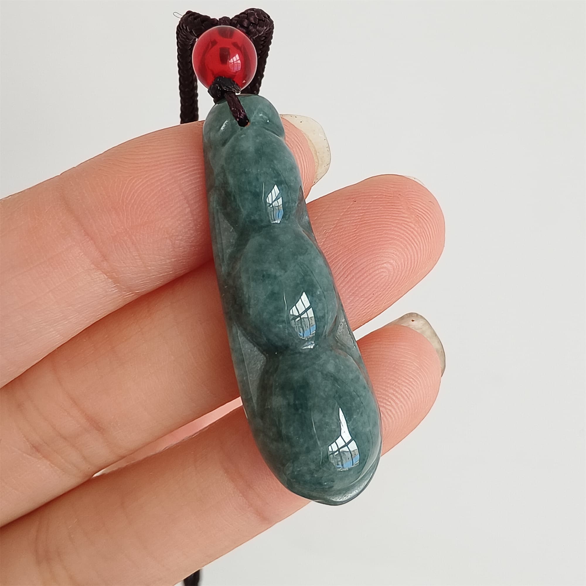 DDP 37.5mm Natural Type A Icy Blue Guatemalan Jadeite Green Bean Pendant