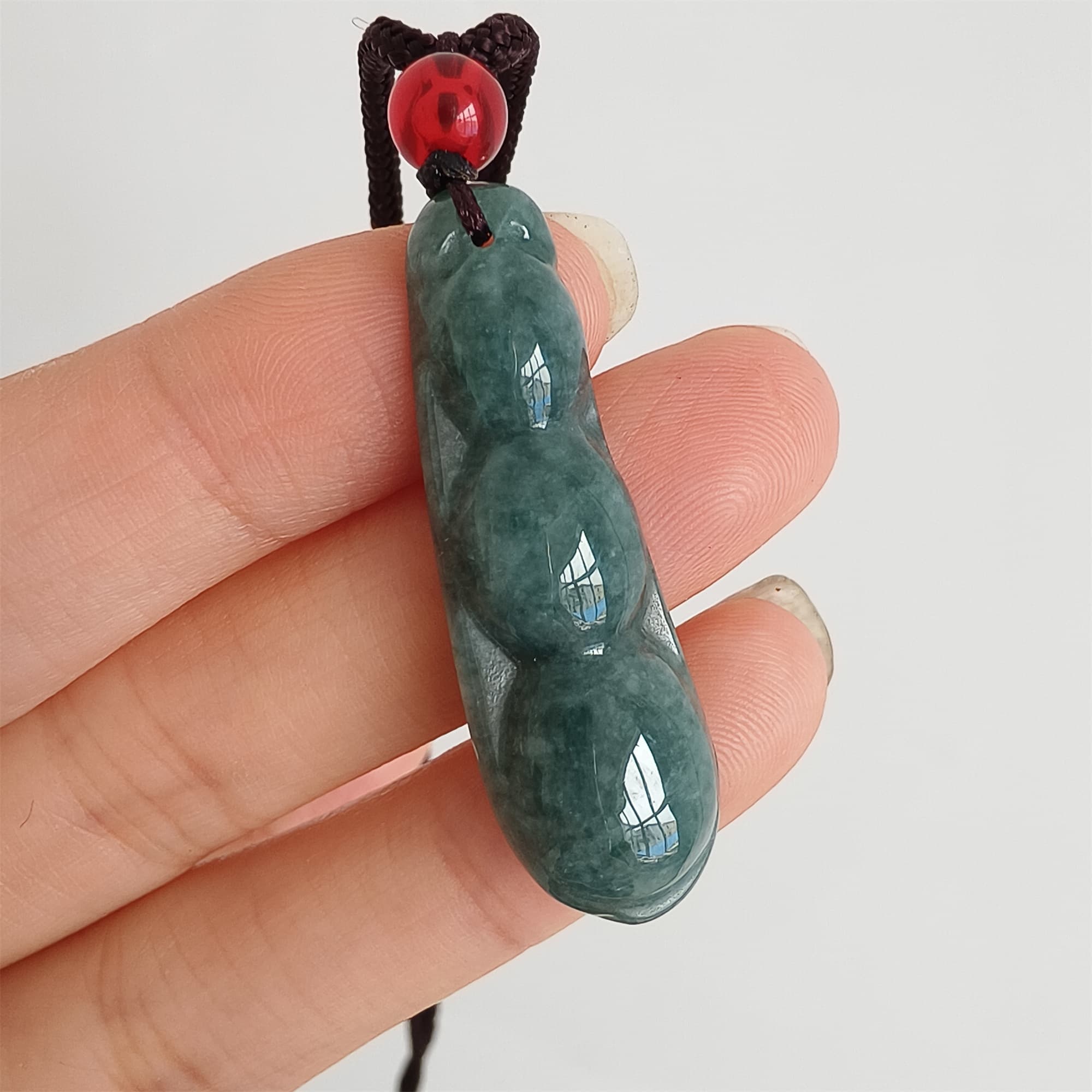 DDP 37.5mm Natural Type A Icy Blue Guatemalan Jadeite Green Bean Pendant