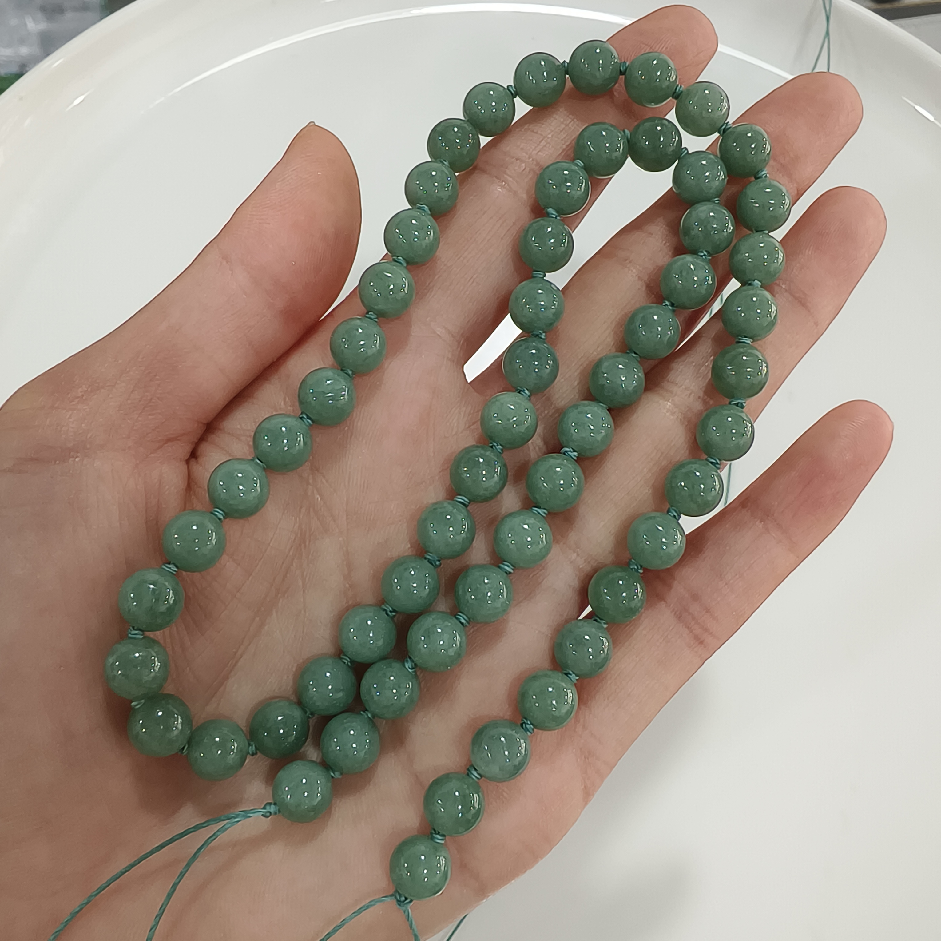 Custom order: 10 strands of green jadeite beads (processing fee included) and 5 strands yellow jadeite beads labor fee