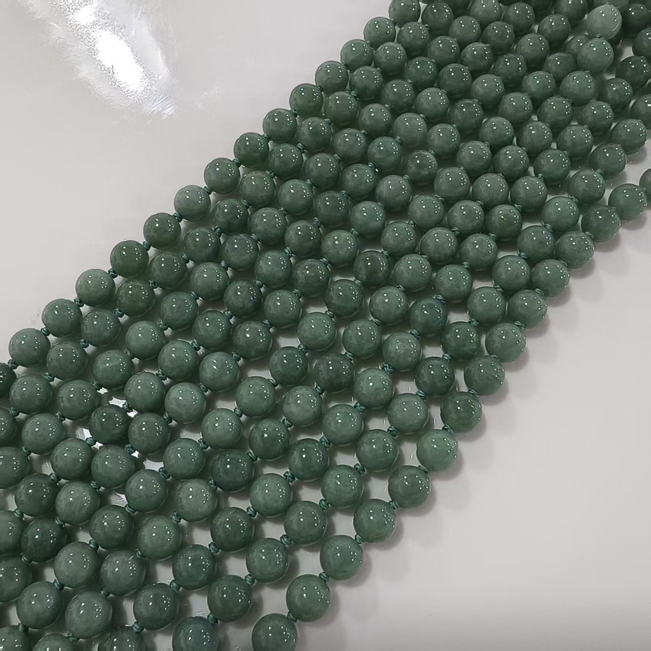 Custom order: 10 strands of green jadeite beads (processing fee included) and 5 strands yellow jadeite beads labor fee