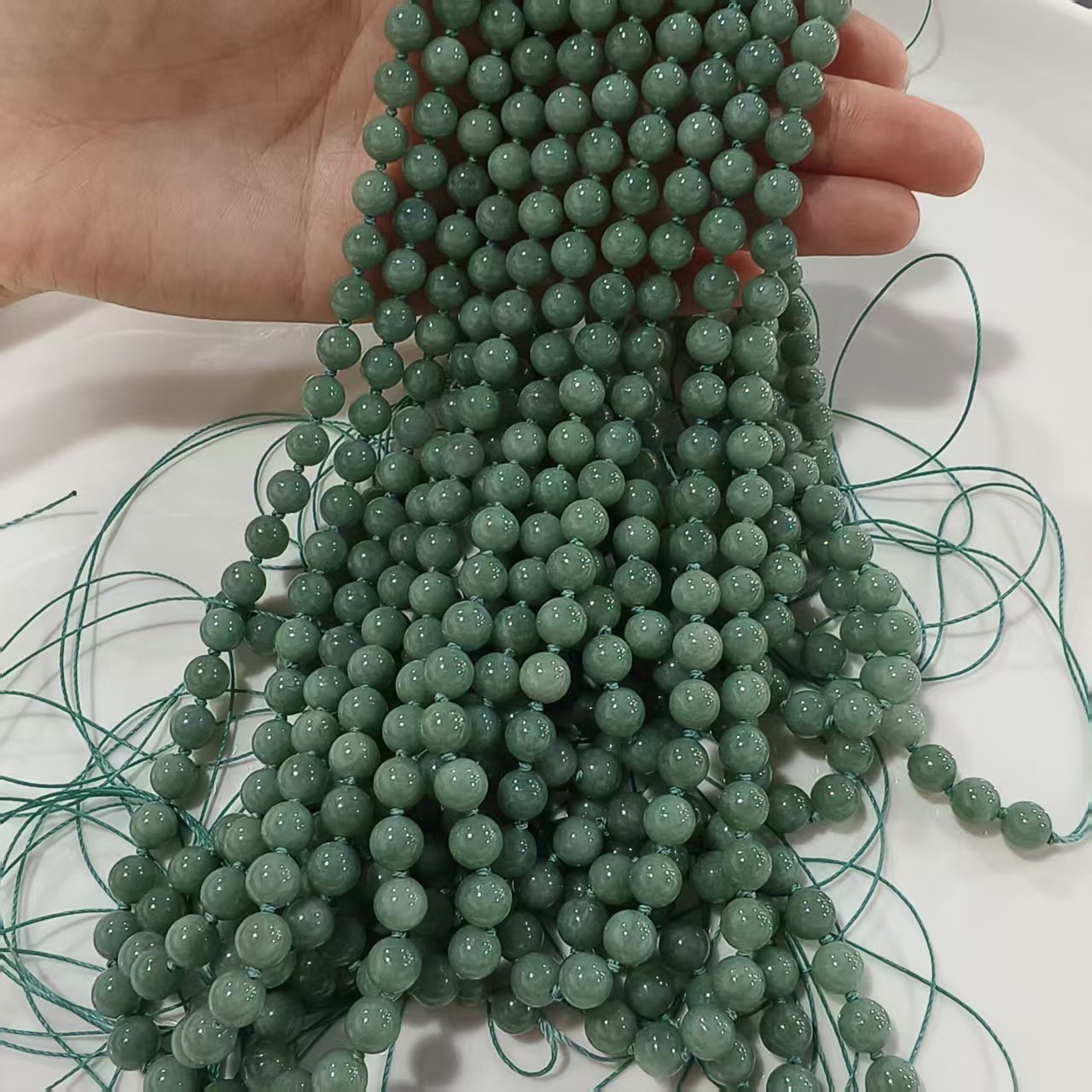 Custom order: 10 strands of green jadeite beads (processing fee included) and 5 strands yellow jadeite beads labor fee