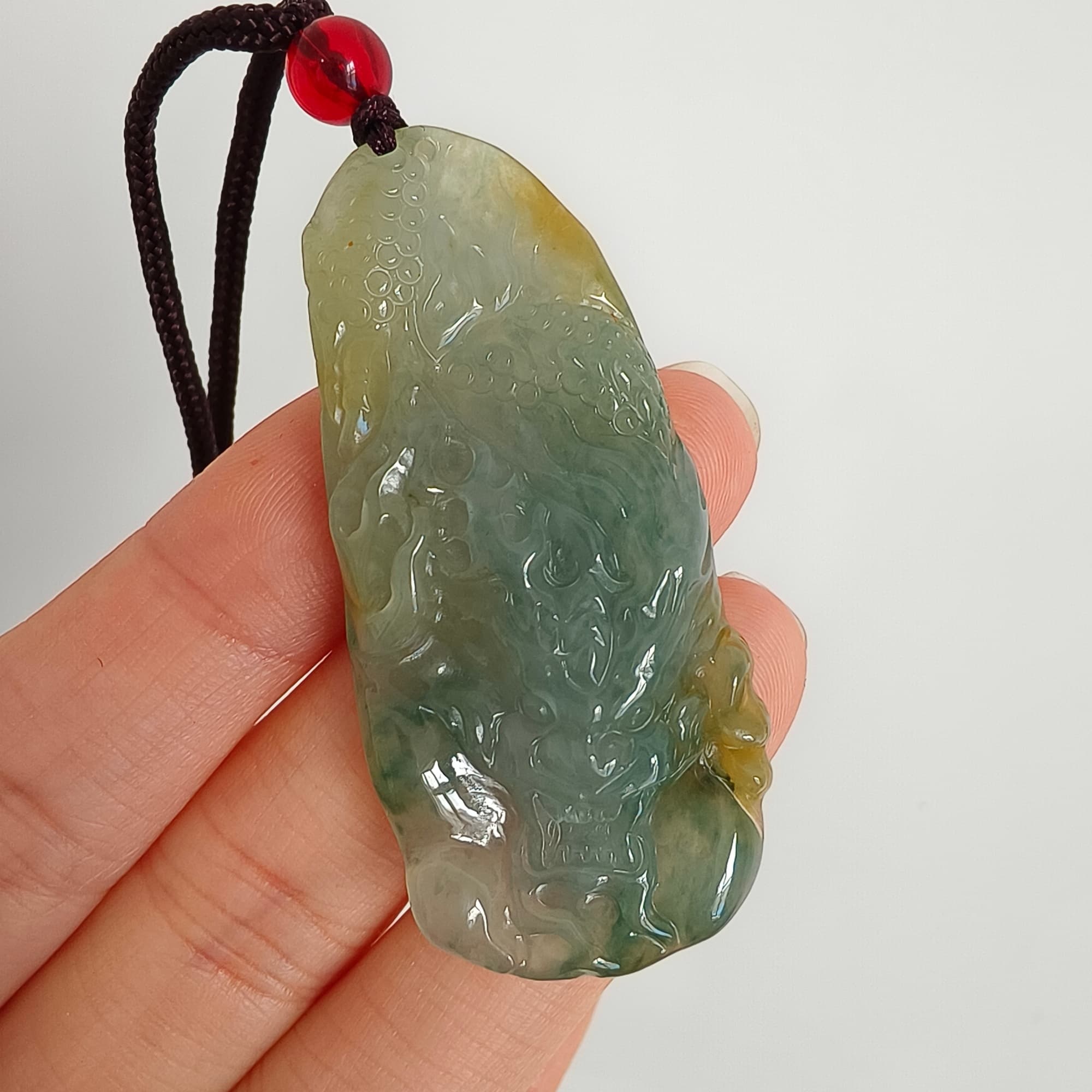DDP 50mm Natural Certificated Icy Blue Yellow Guatemalan Jadeite Dragon Pendant