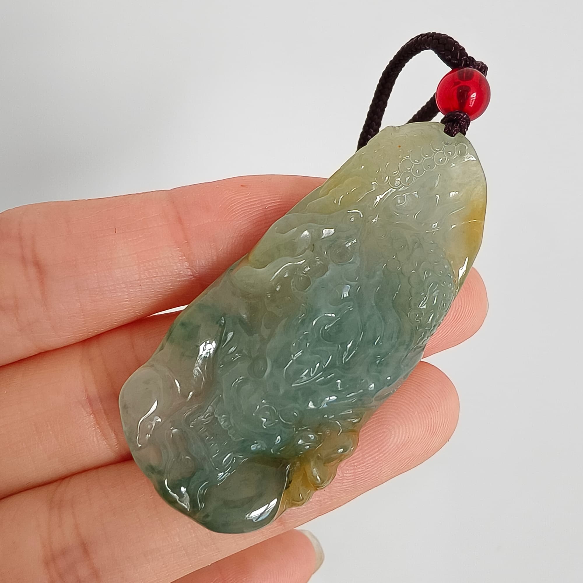 DDP 50mm Natural Certificated Icy Blue Yellow Guatemalan Jadeite Dragon Pendant