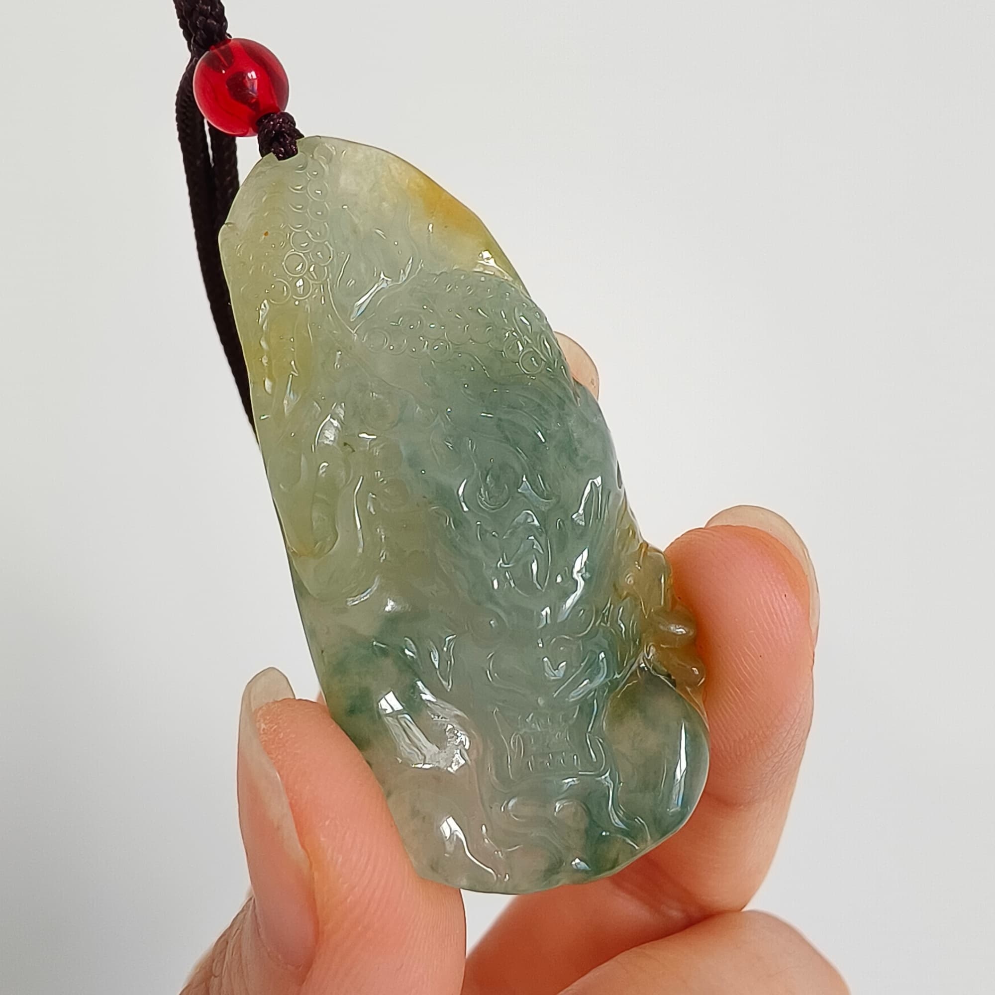 DDP 50mm Natural Certificated Icy Blue Yellow Guatemalan Jadeite Dragon Pendant