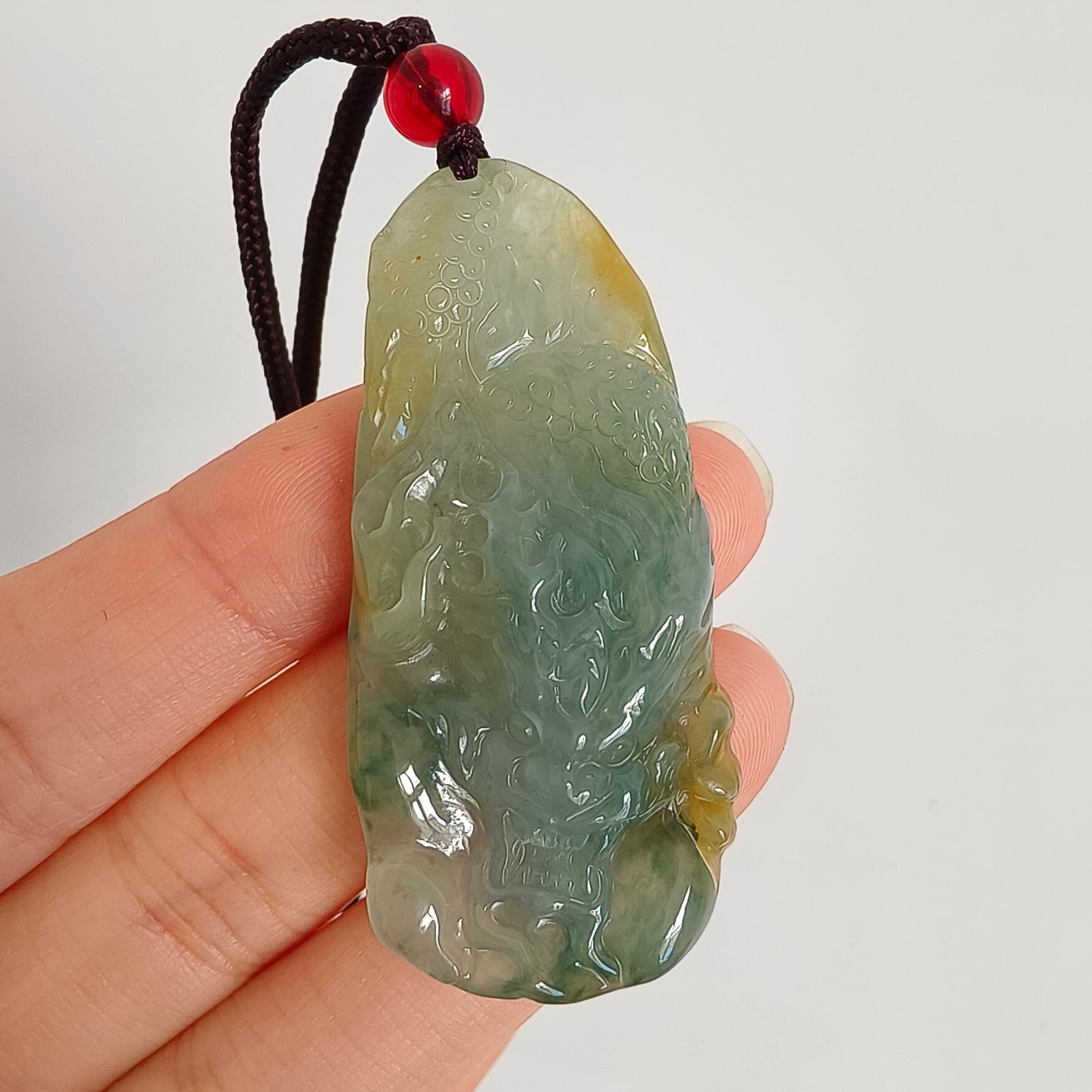 DDP 50mm Natural Certificated Icy Blue Yellow Guatemalan Jadeite Dragon Pendant