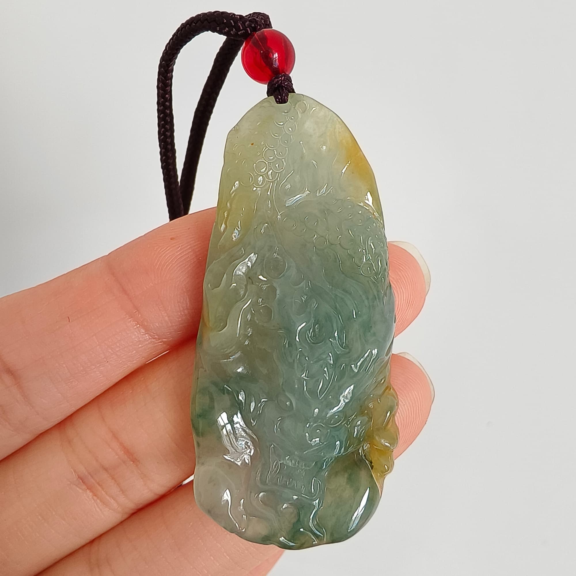 DDP 50mm Natural Certificated Icy Blue Yellow Guatemalan Jadeite Dragon Pendant