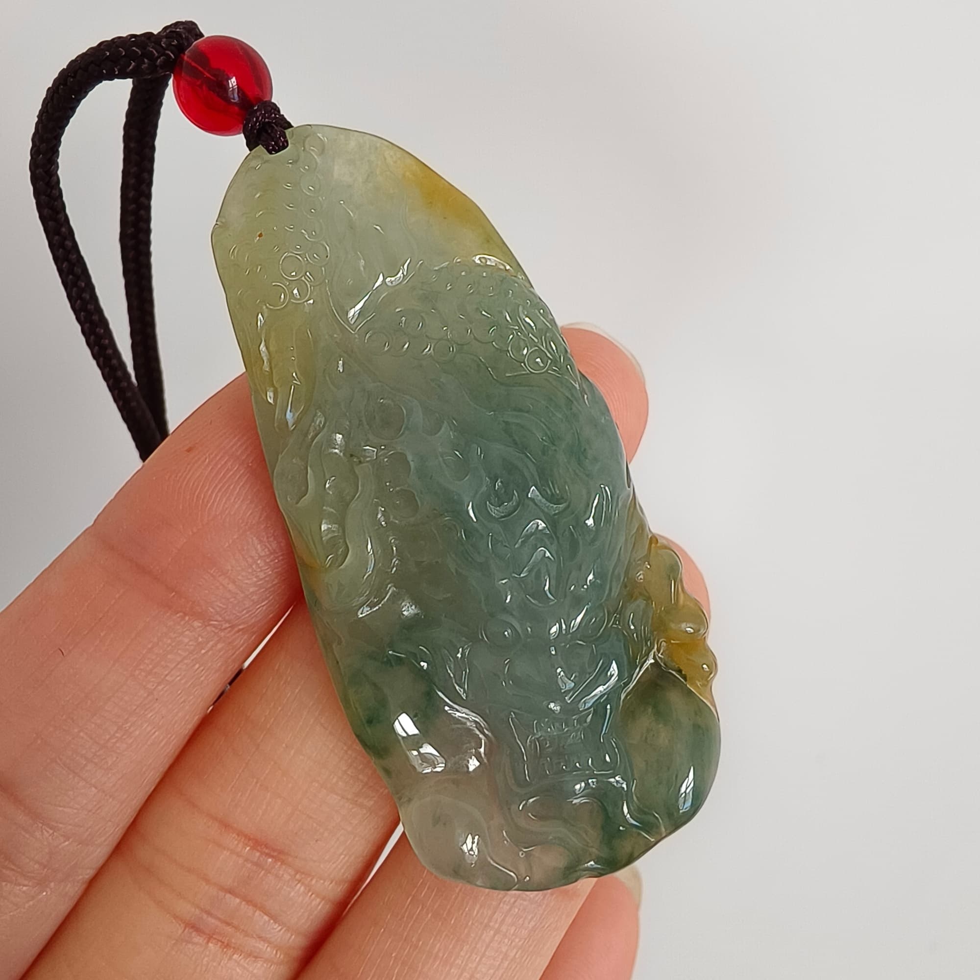 DDP 50mm Natural Certificated Icy Blue Yellow Guatemalan Jadeite Dragon Pendant