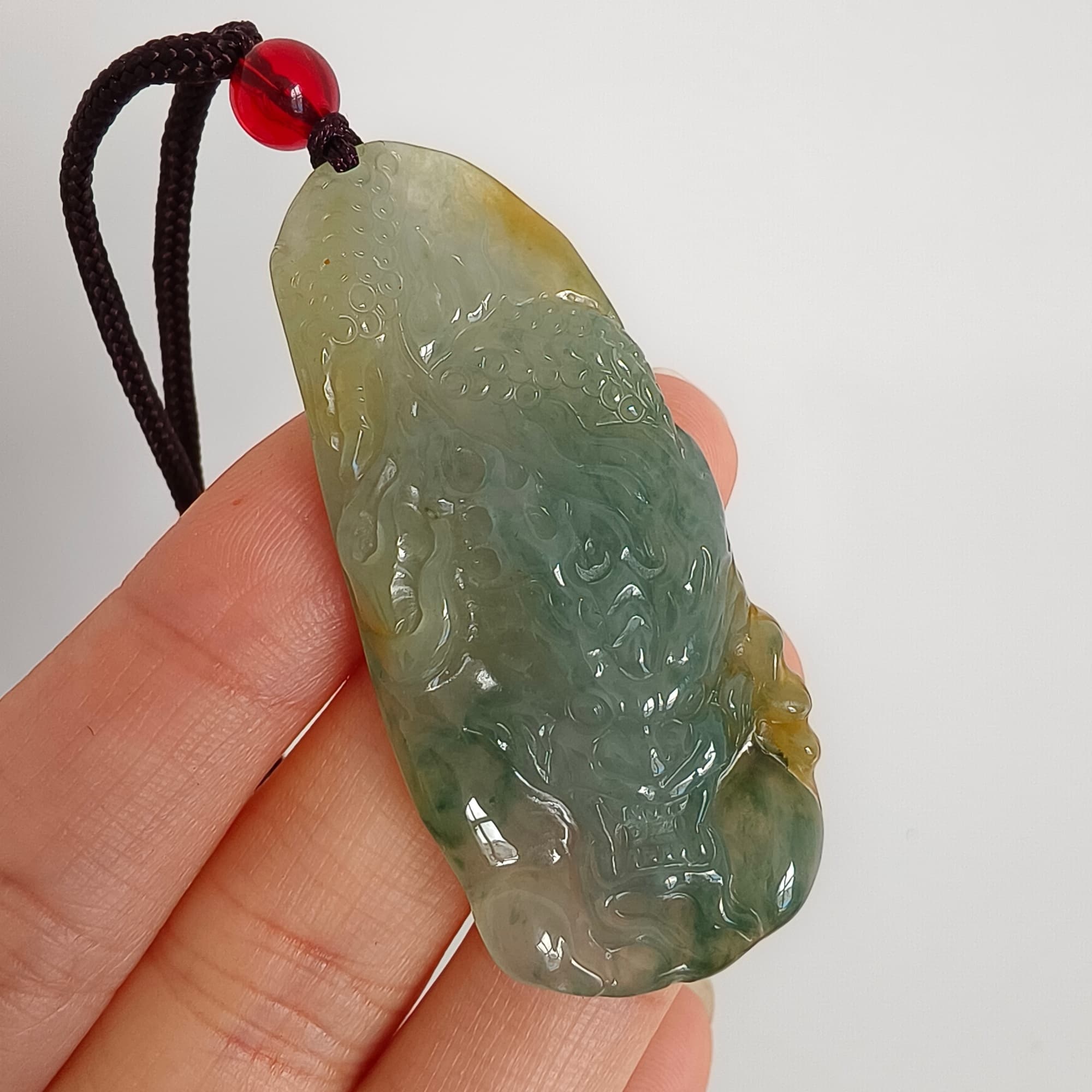 DDP 50mm Natural Certificated Icy Blue Yellow Guatemalan Jadeite Dragon Pendant