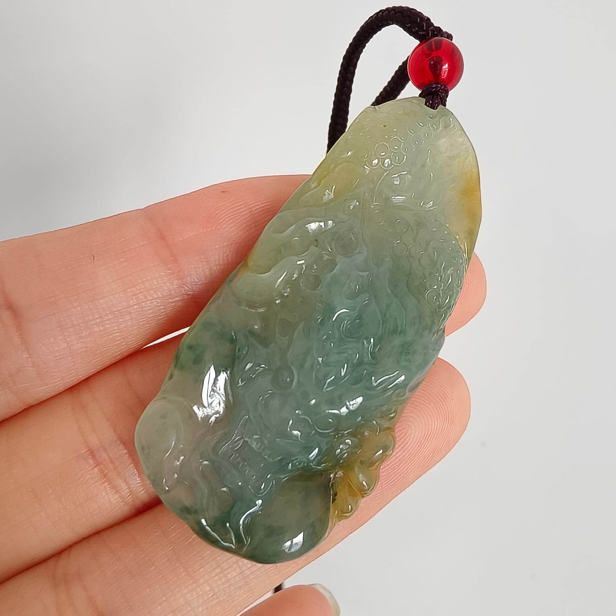 DDP 50mm Natural Certificated Icy Blue Yellow Guatemalan Jadeite Dragon Pendant