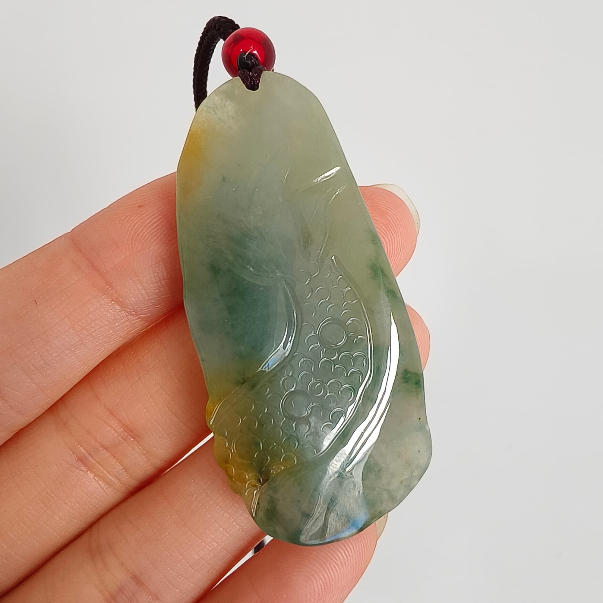 DDP 50mm Natural Certificated Icy Blue Yellow Guatemalan Jadeite Dragon Pendant