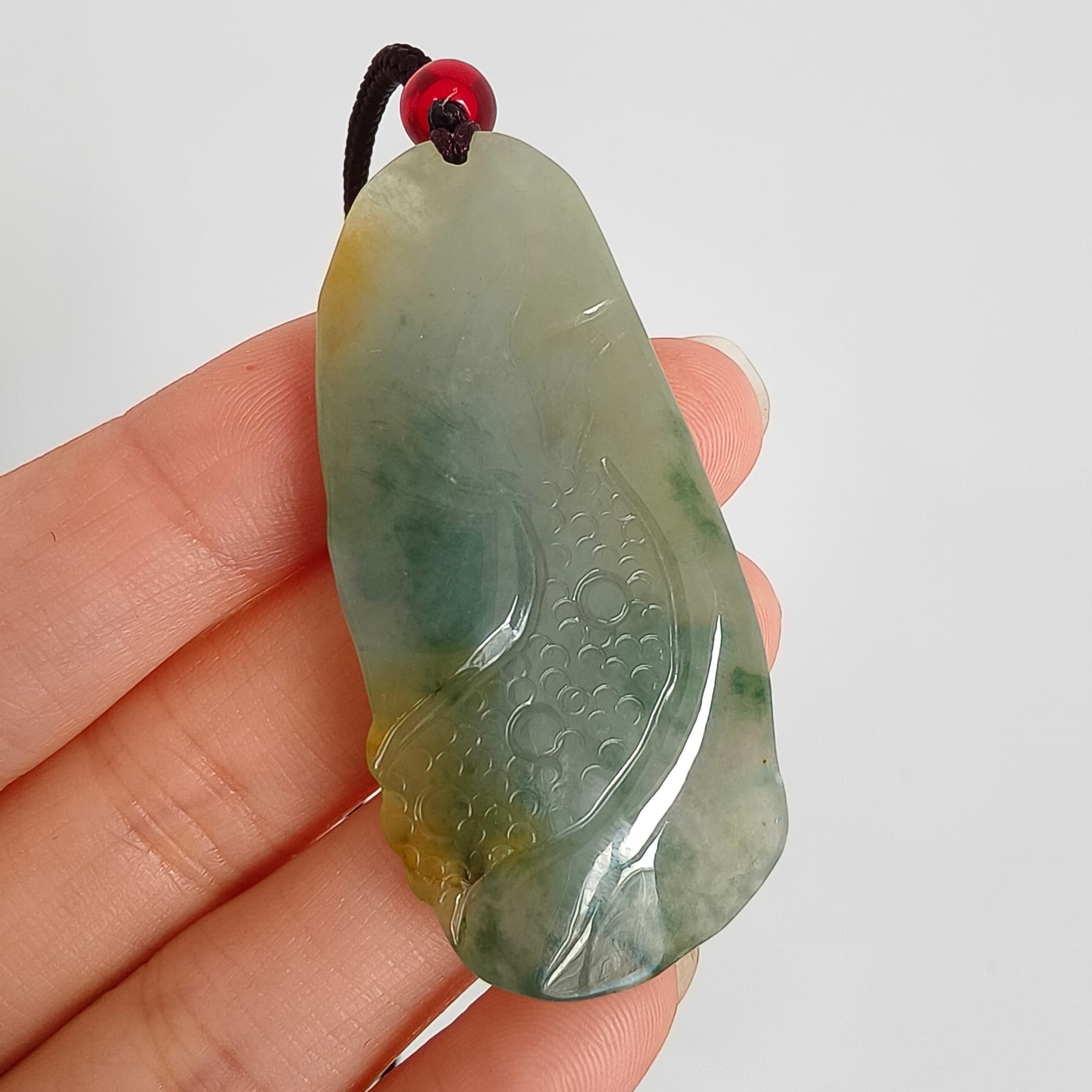 DDP 50mm Natural Certificated Icy Blue Yellow Guatemalan Jadeite Dragon Pendant