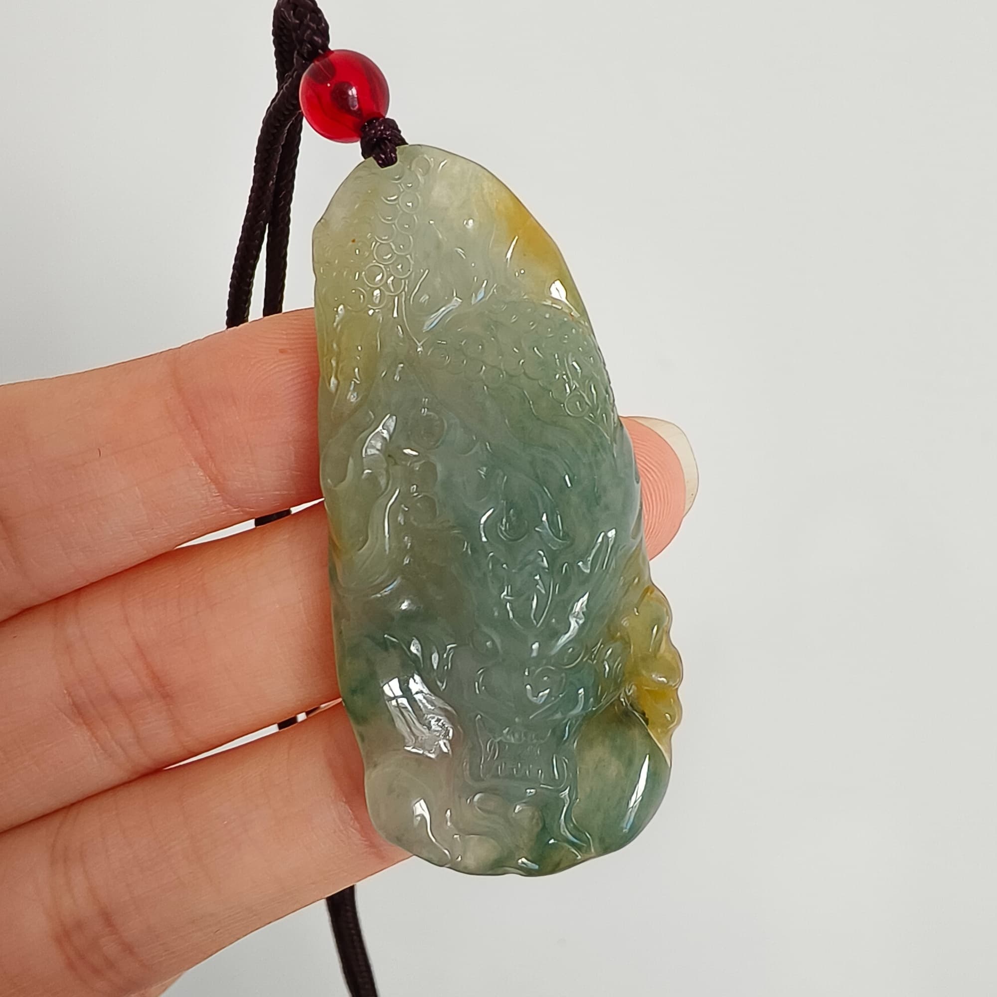 DDP 50mm Natural Certificated Icy Blue Yellow Guatemalan Jadeite Dragon Pendant