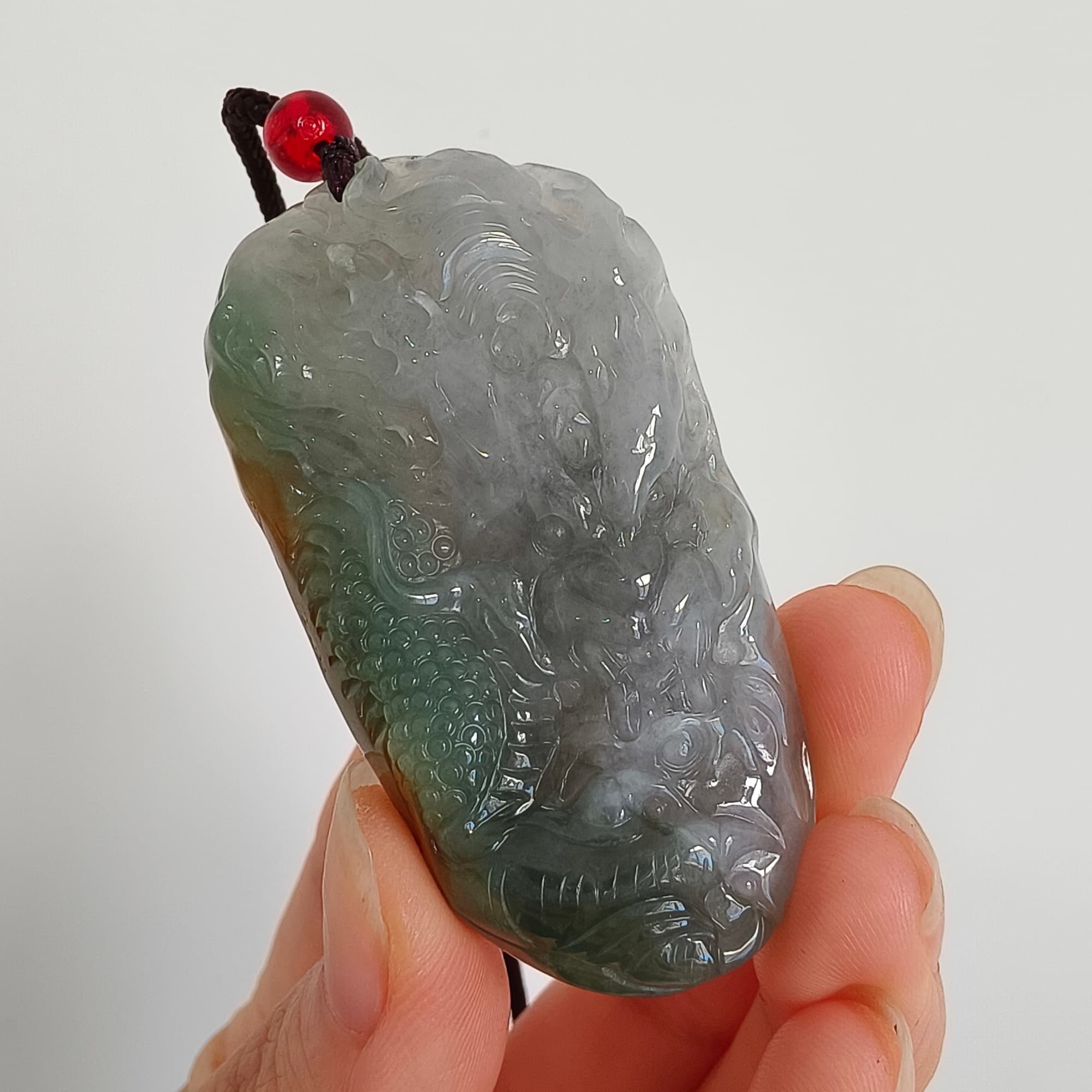 DDP 55mm Natural Certificated Icy Blue Yellow Gray Guatemalan Jadeite Dragon Pendant