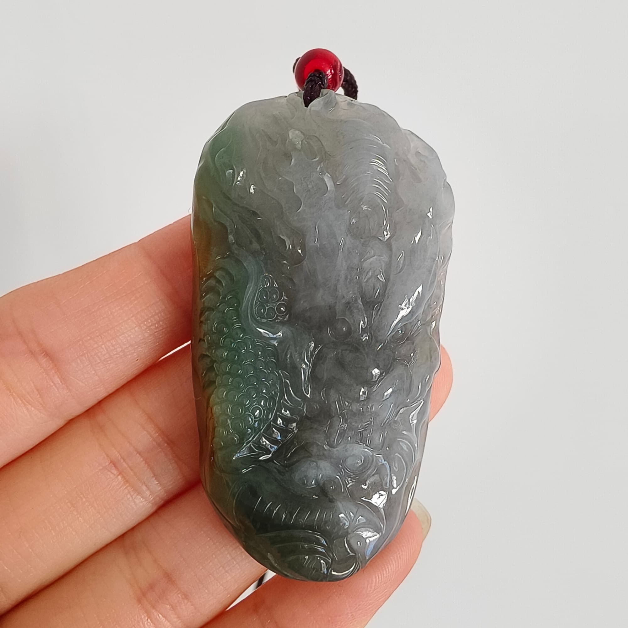 DDP 55mm Natural Certificated Icy Blue Yellow Gray Guatemalan Jadeite Dragon Pendant