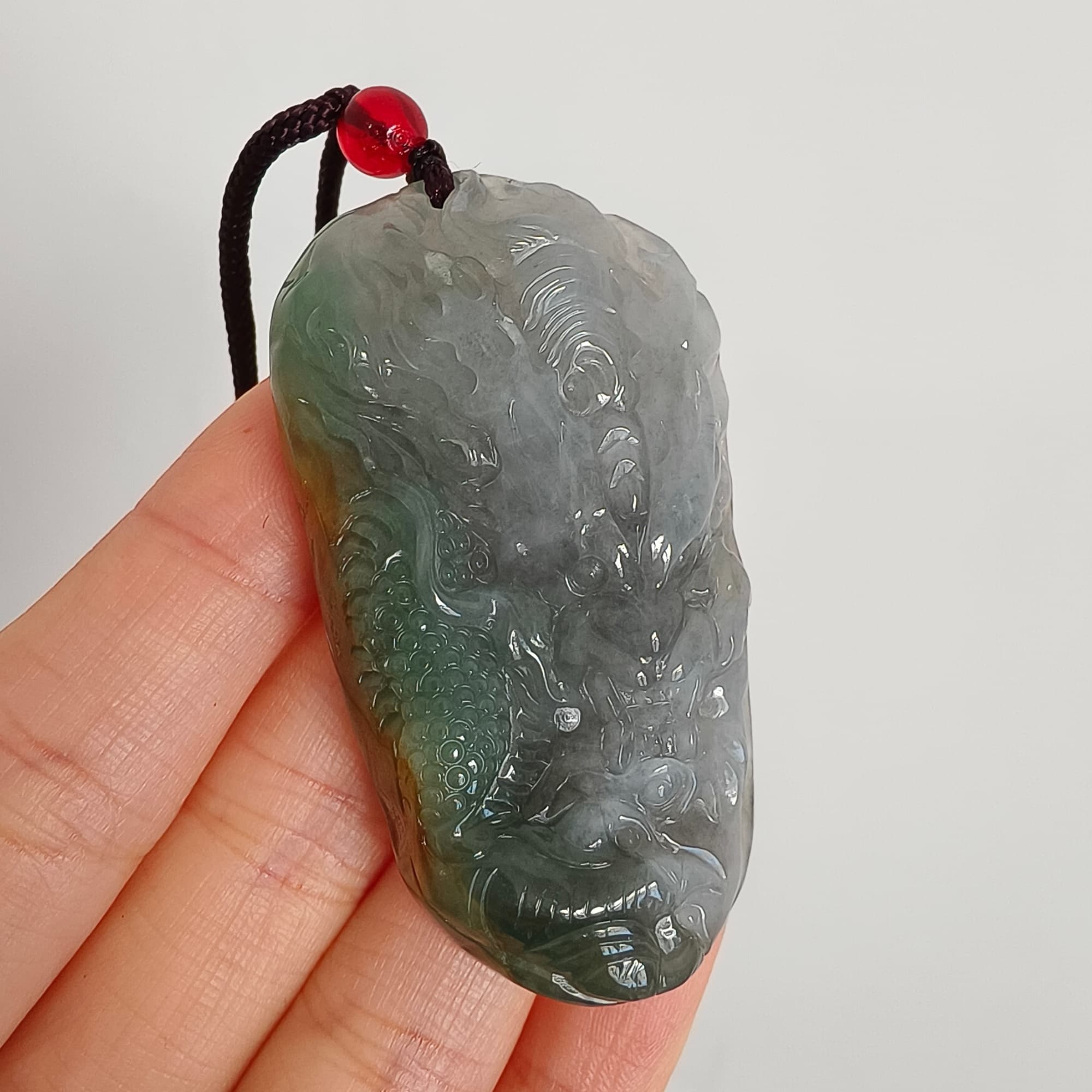 DDP 55mm Natural Certificated Icy Blue Yellow Gray Guatemalan Jadeite Dragon Pendant