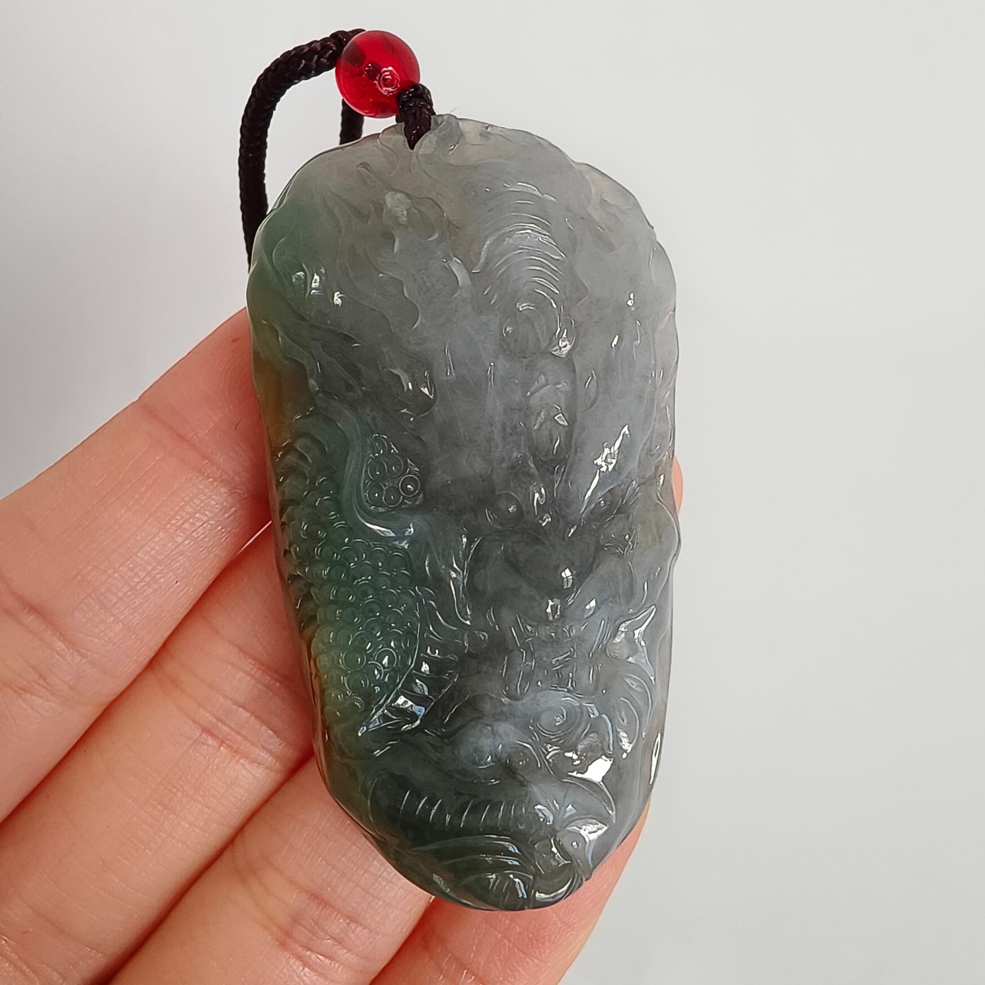 DDP 55mm Natural Certificated Icy Blue Yellow Gray Guatemalan Jadeite Dragon Pendant