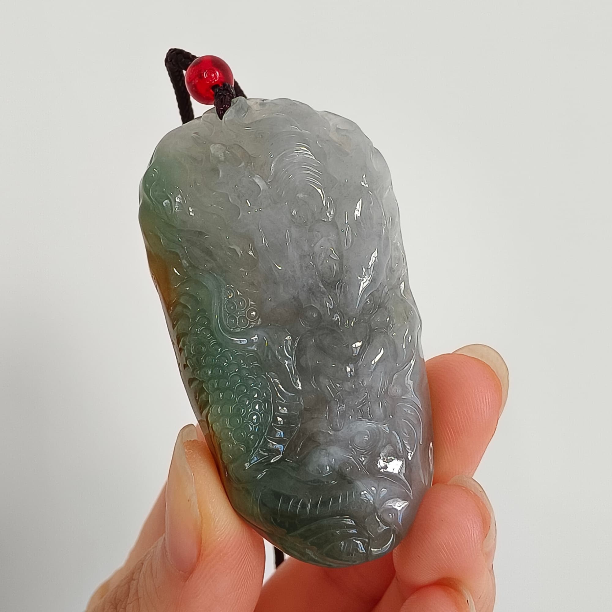DDP 55mm Natural Certificated Icy Blue Yellow Gray Guatemalan Jadeite Dragon Pendant