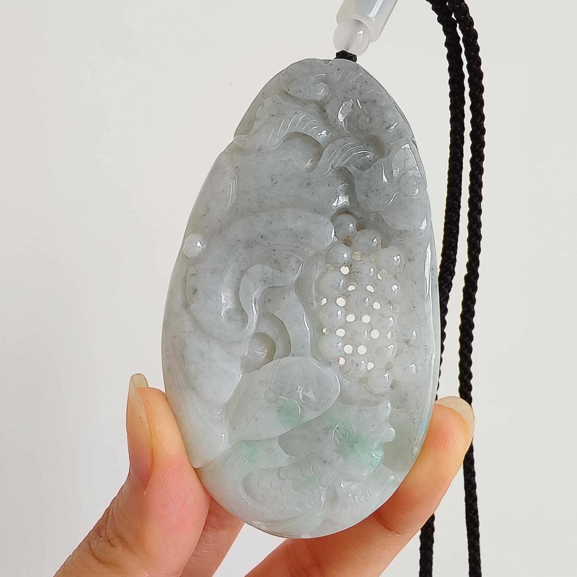 DDP 76mm Natural Certificated Type A Untreated Black Chicken Species Burmese Jadeite Oval Pendant With Grape Fish And Ruyi Carved