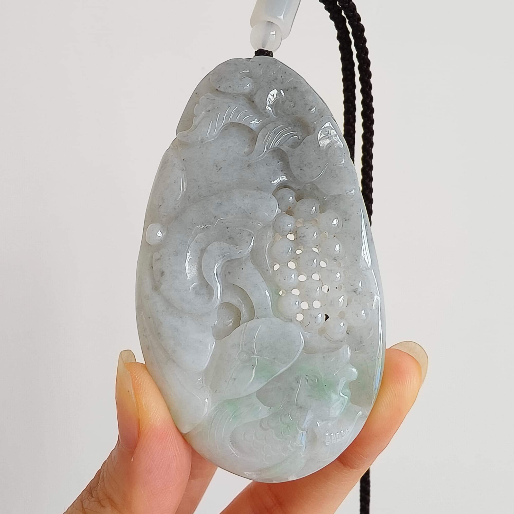 DDP 76mm Natural Certificated Type A Untreated Black Chicken Species Burmese Jadeite Oval Pendant With Grape Fish And Ruyi Carved