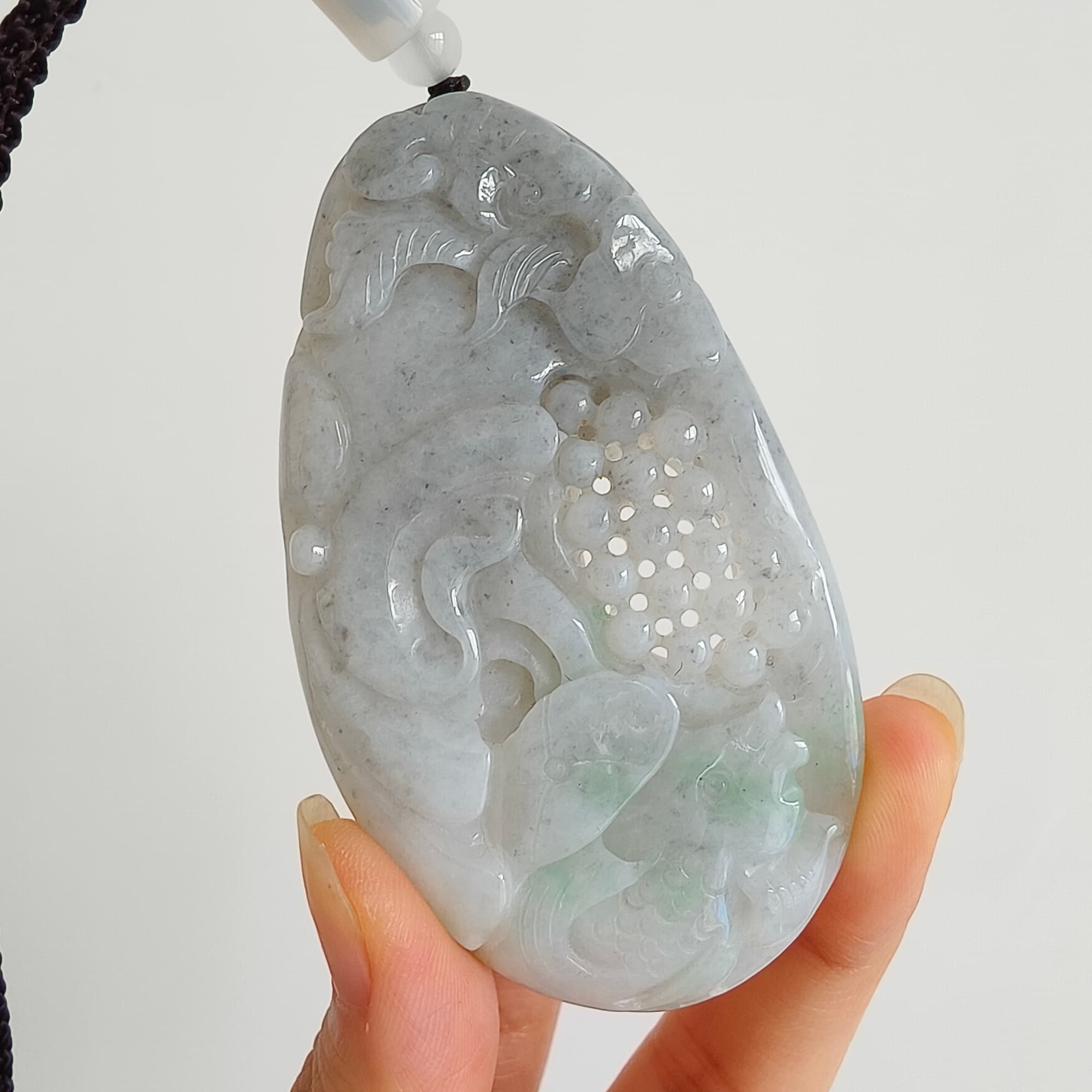DDP 76mm Natural Certificated Type A Untreated Black Chicken Species Burmese Jadeite Oval Pendant With Grape Fish And Ruyi Carved