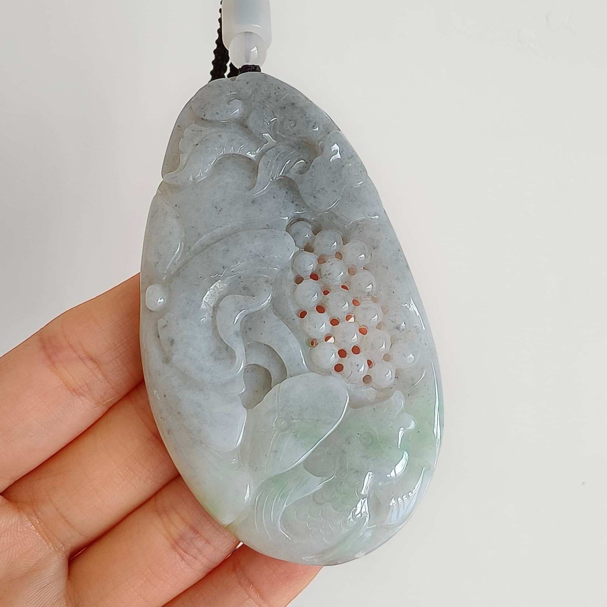 DDP 76mm Natural Certificated Type A Untreated Black Chicken Species Burmese Jadeite Oval Pendant With Grape Fish And Ruyi Carved
