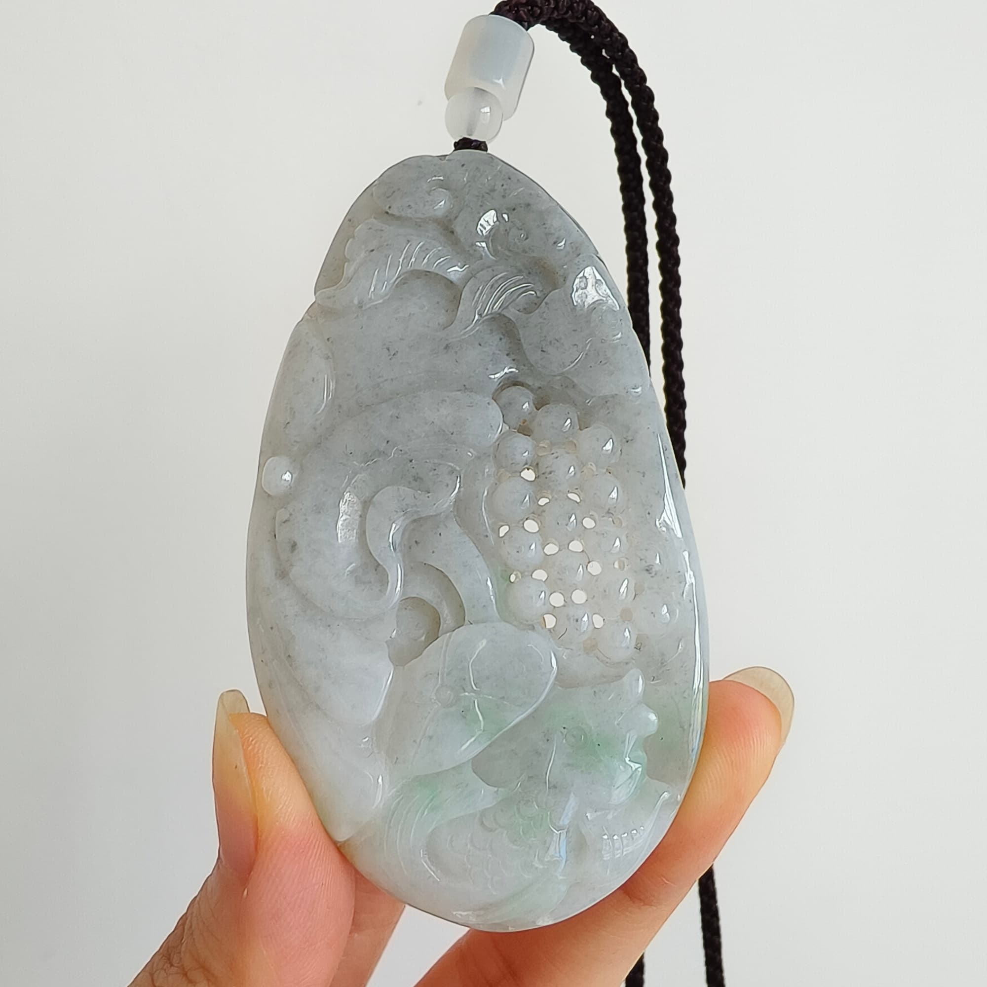 DDP 76mm Natural Certificated Type A Untreated Black Chicken Species Burmese Jadeite Oval Pendant With Grape Fish And Ruyi Carved