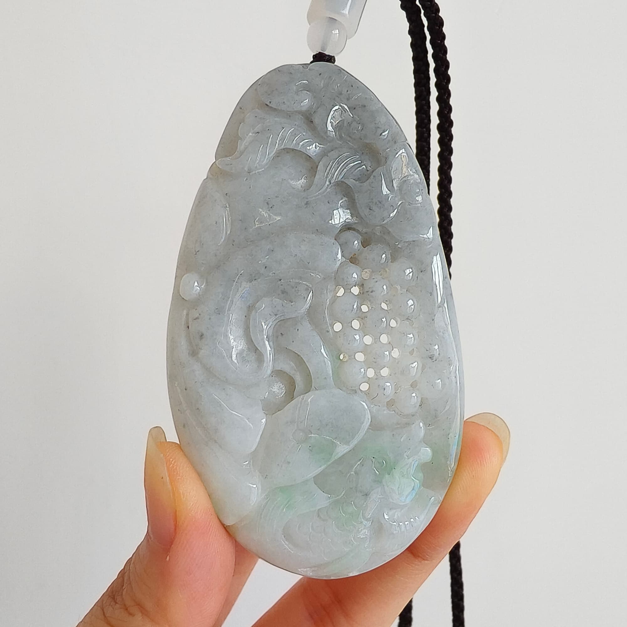 DDP 76mm Natural Certificated Type A Untreated Black Chicken Species Burmese Jadeite Oval Pendant With Grape Fish And Ruyi Carved
