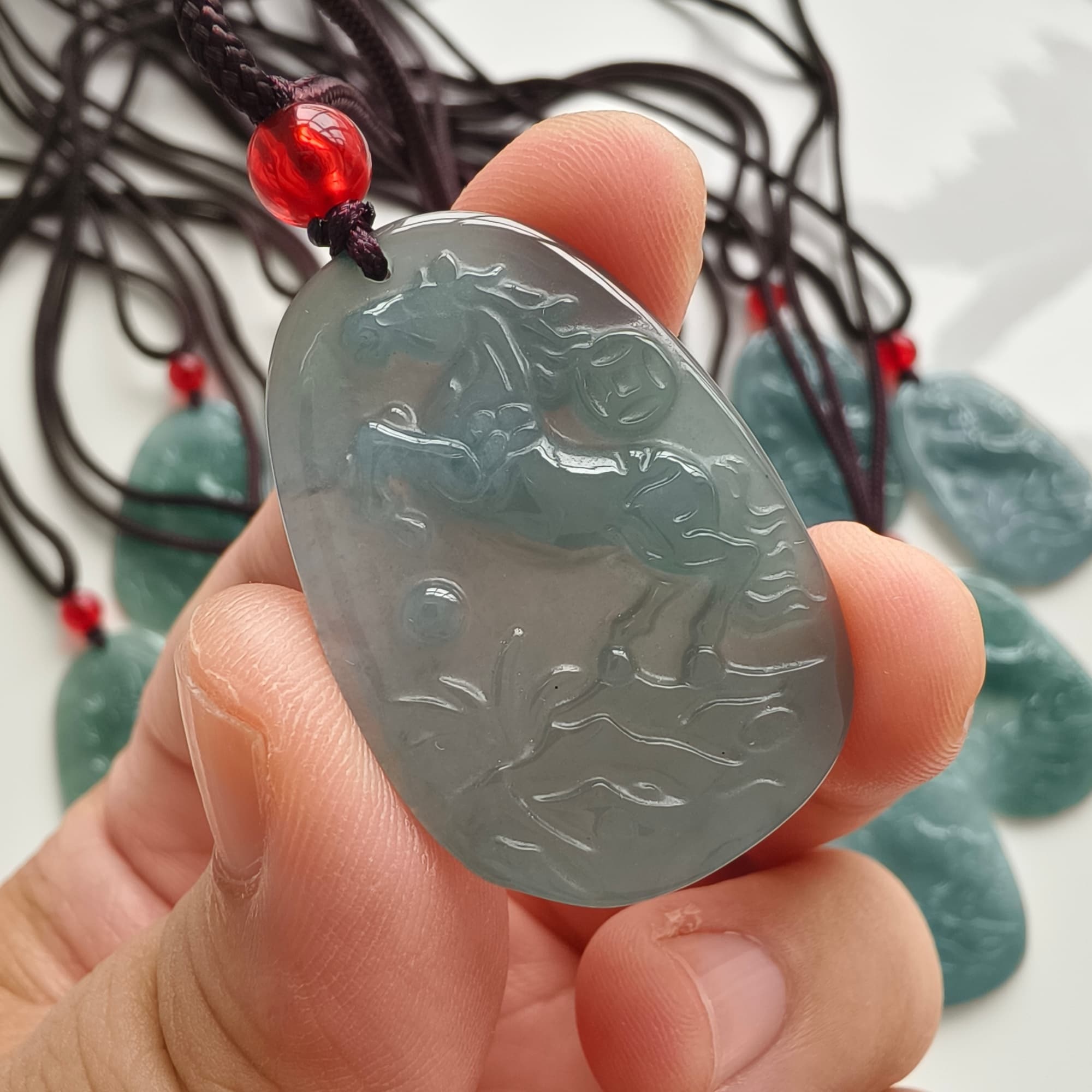 DDP 36.5mm Natural Certificated Type A Icy Blue Guatemalan Jadeite Oval Horse Pendant