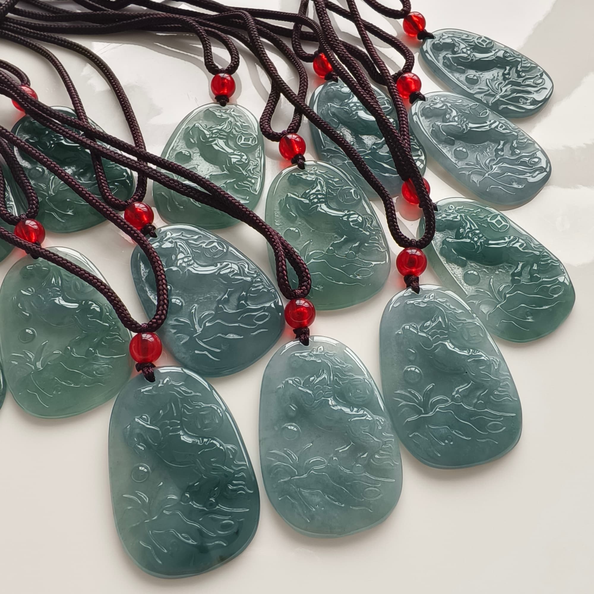 DDP 36.5mm Natural Certificated Type A Icy Blue Guatemalan Jadeite Oval Horse Pendant