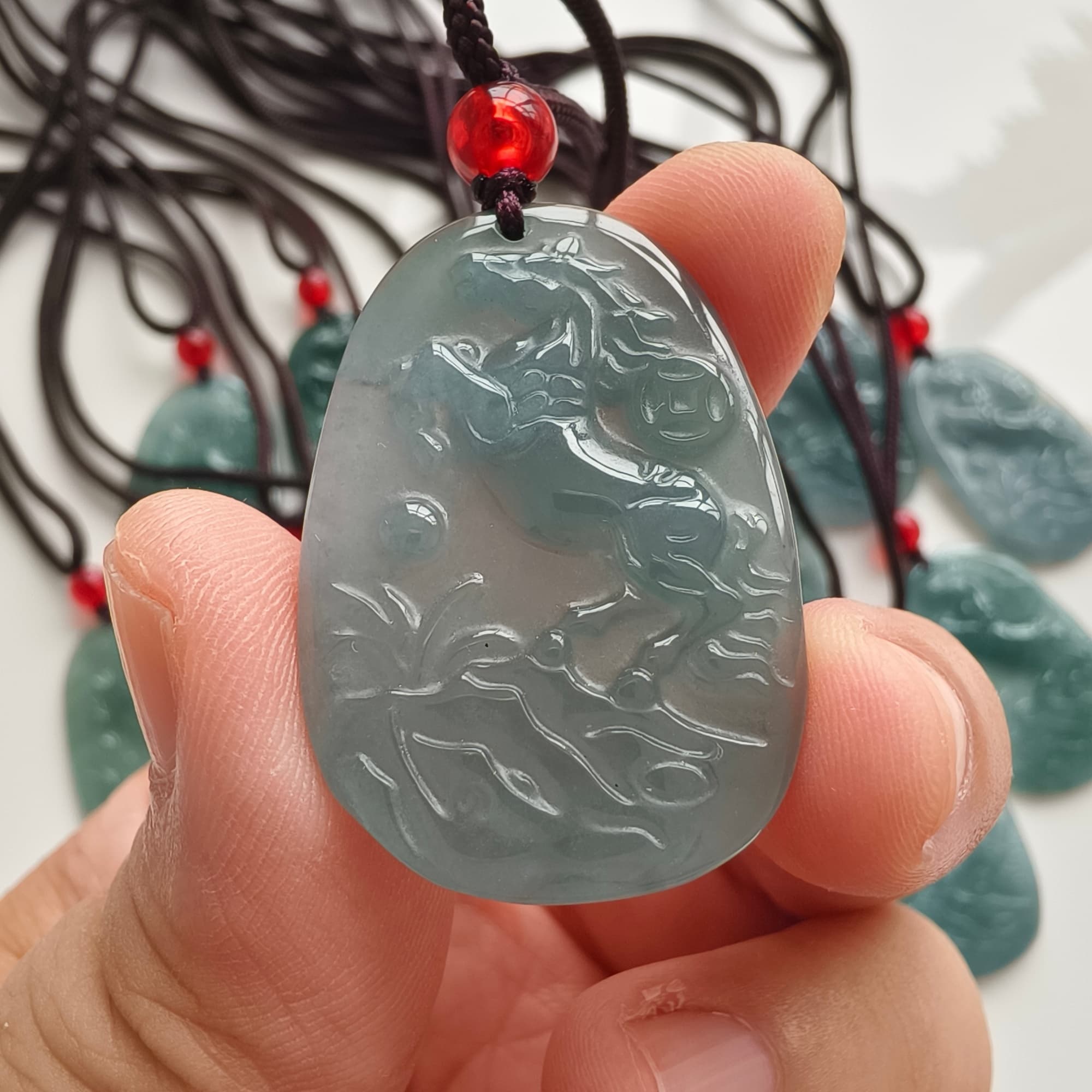 DDP 36.5mm Natural Certificated Type A Icy Blue Guatemalan Jadeite Oval Horse Pendant