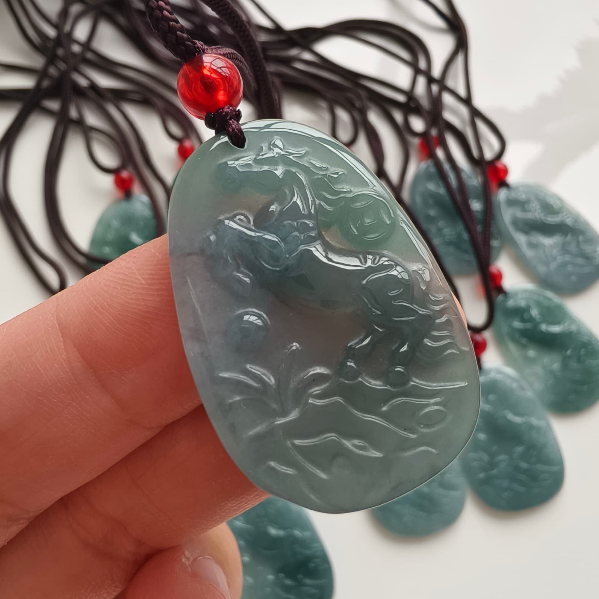 DDP 36.5mm Natural Certificated Type A Icy Blue Guatemalan Jadeite Oval Horse Pendant