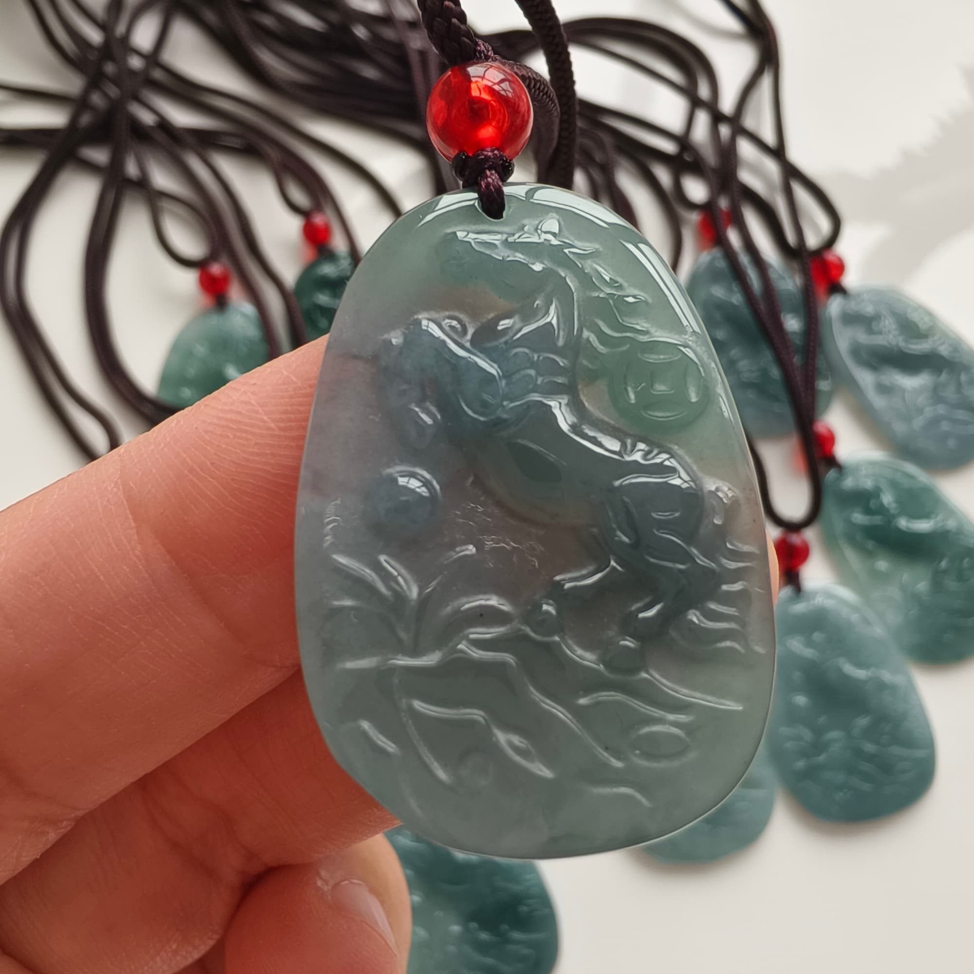 DDP 36.5mm Natural Certificated Type A Icy Blue Guatemalan Jadeite Oval Horse Pendant