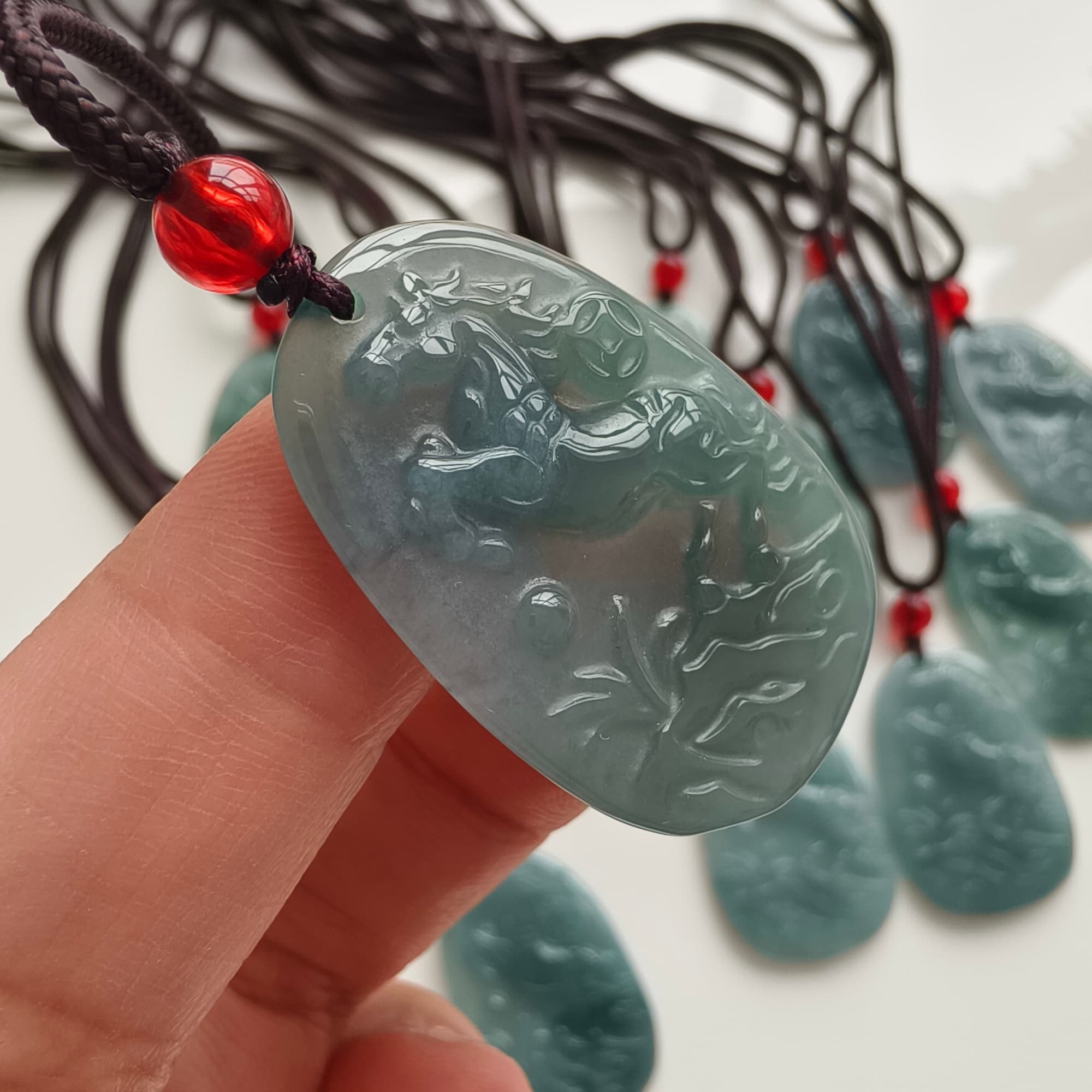 DDP 36.5mm Natural Certificated Type A Icy Blue Guatemalan Jadeite Oval Horse Pendant