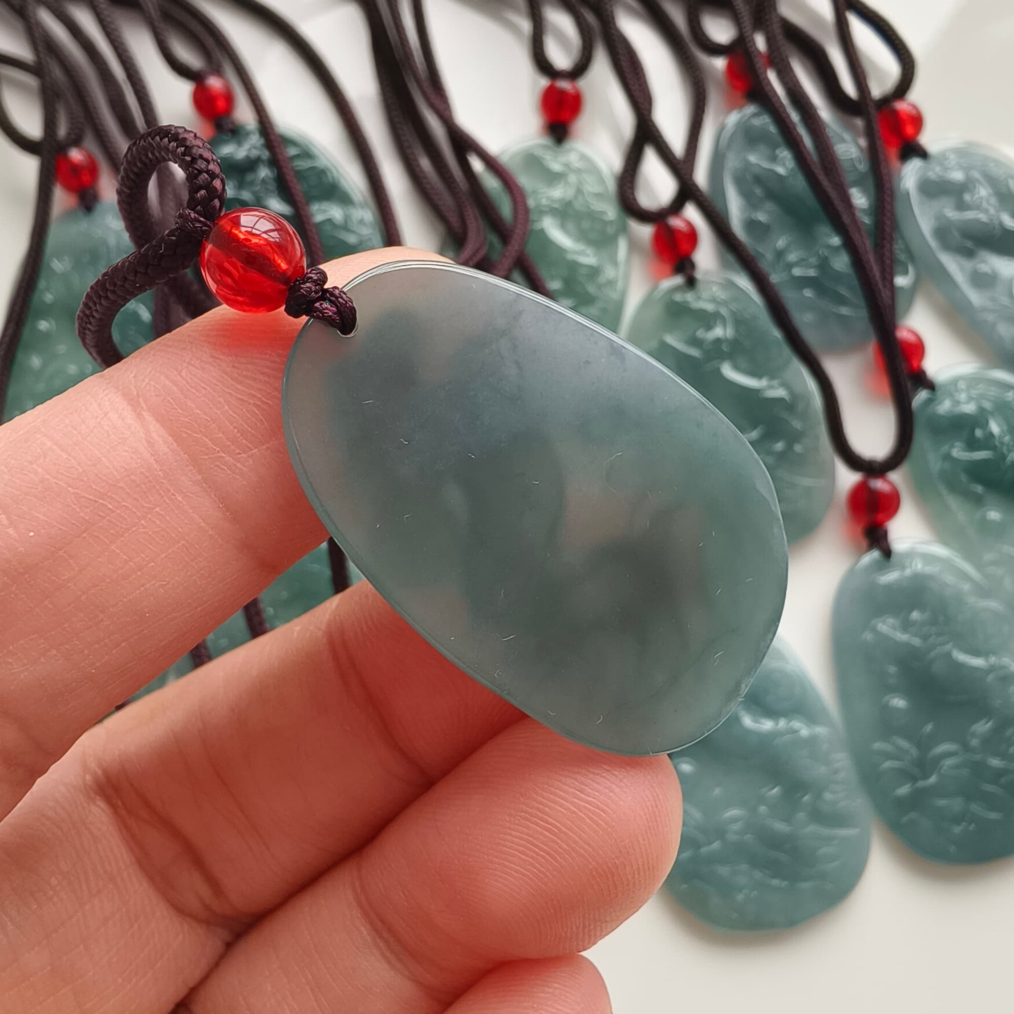 DDP 36.5mm Natural Certificated Type A Icy Blue Guatemalan Jadeite Oval Horse Pendant