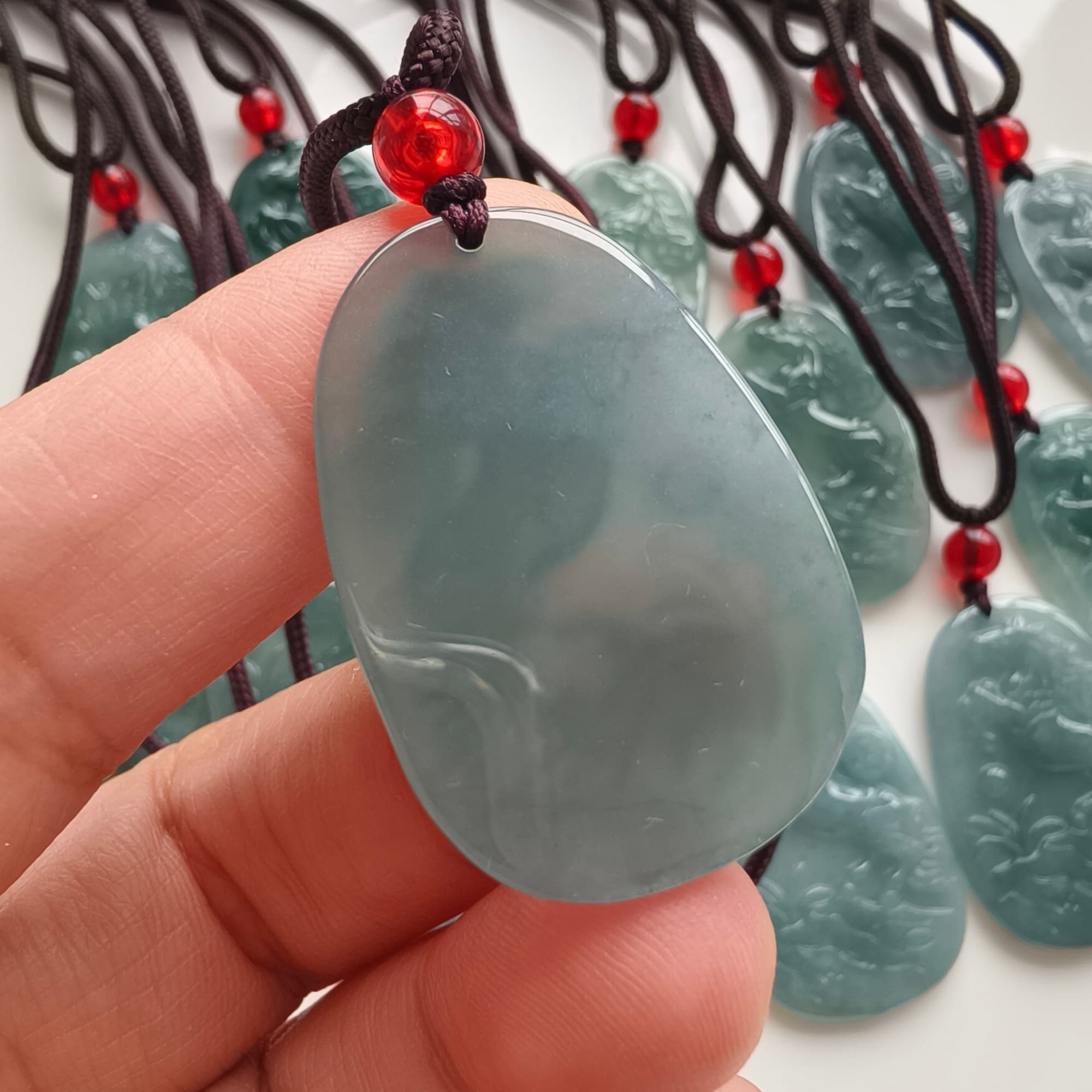 DDP 36.5mm Natural Certificated Type A Icy Blue Guatemalan Jadeite Oval Horse Pendant
