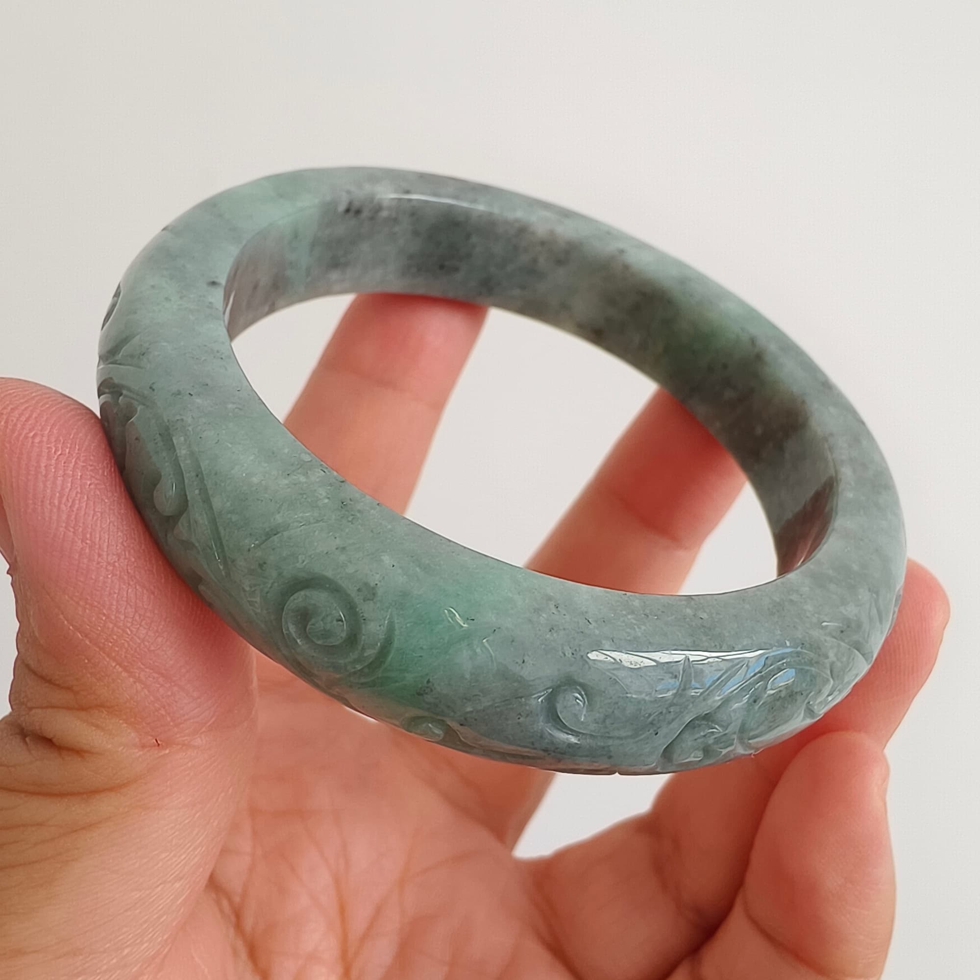 DDP 56mm Natural Type A Black Chicken Species Burmese Jadeite Round Band Bangle With Ruyi Carved
