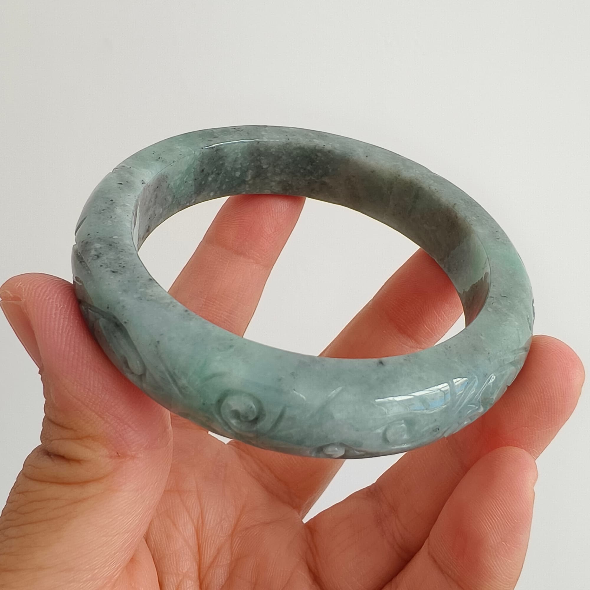 DDP 56mm Natural Type A Black Chicken Species Burmese Jadeite Round Band Bangle With Ruyi Carved