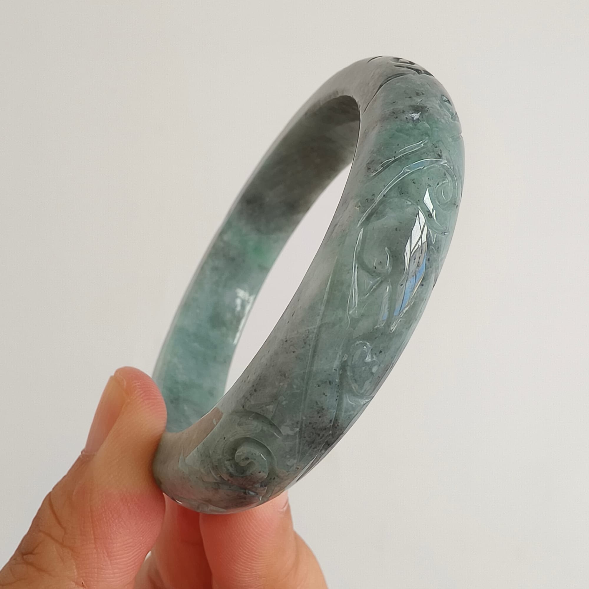 DDP 56mm Natural Type A Black Chicken Species Burmese Jadeite Round Band Bangle With Ruyi Carved