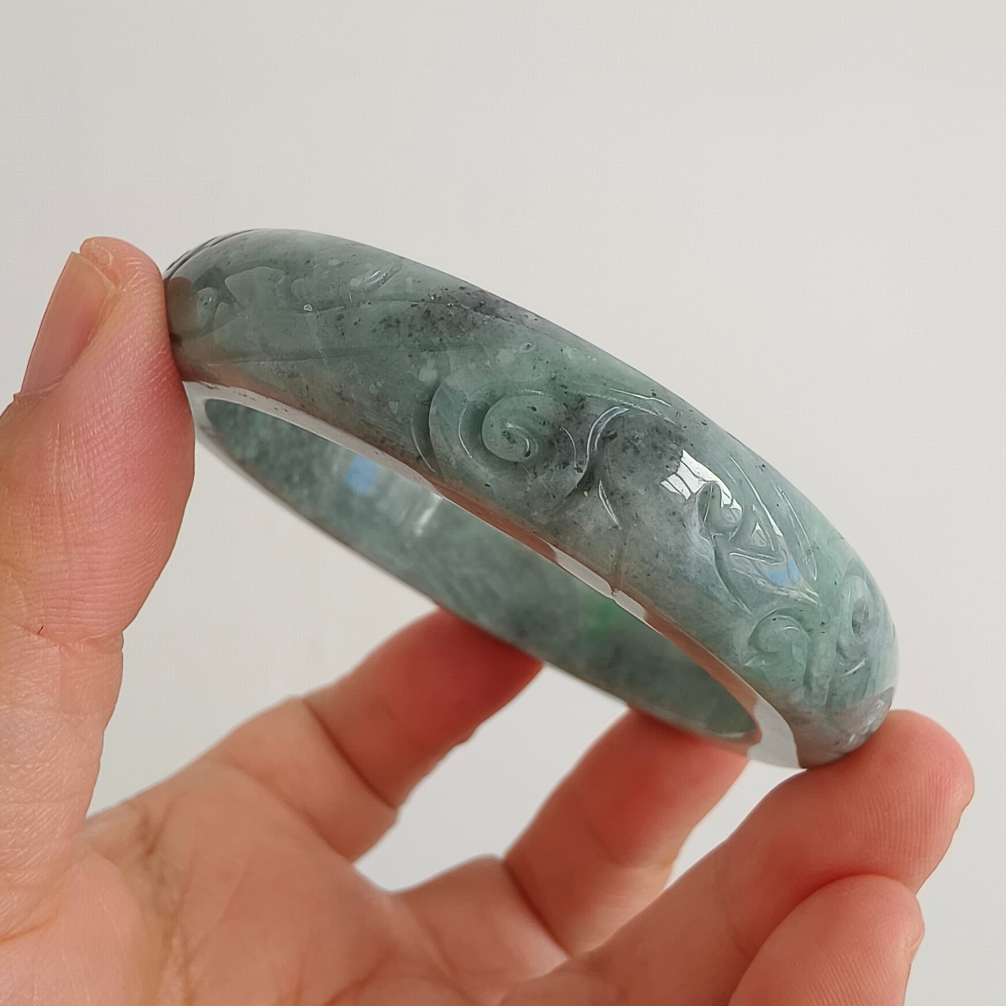 DDP 56mm Natural Type A Black Chicken Species Burmese Jadeite Round Band Bangle With Ruyi Carved