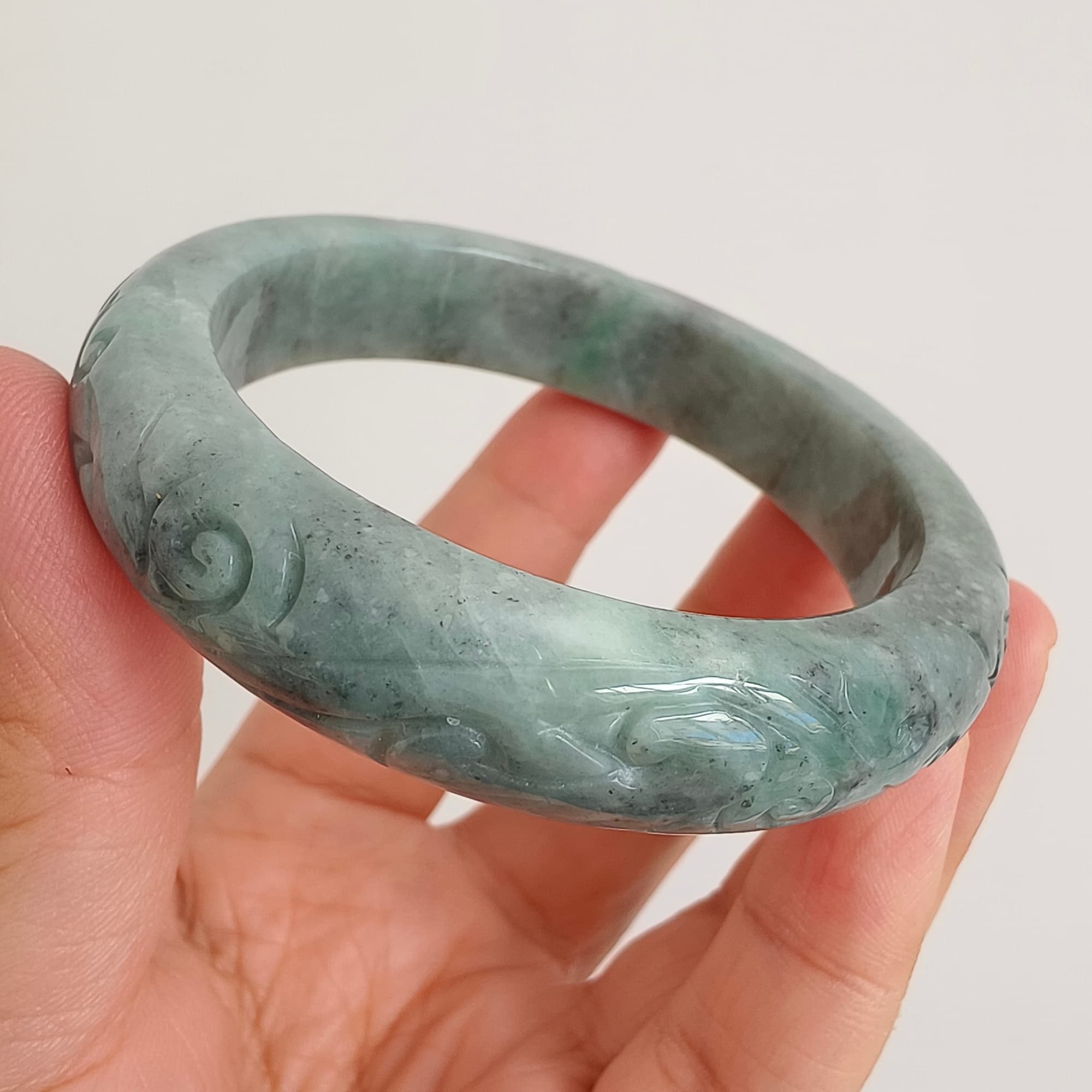 DDP 56mm Natural Type A Black Chicken Species Burmese Jadeite Round Band Bangle With Ruyi Carved