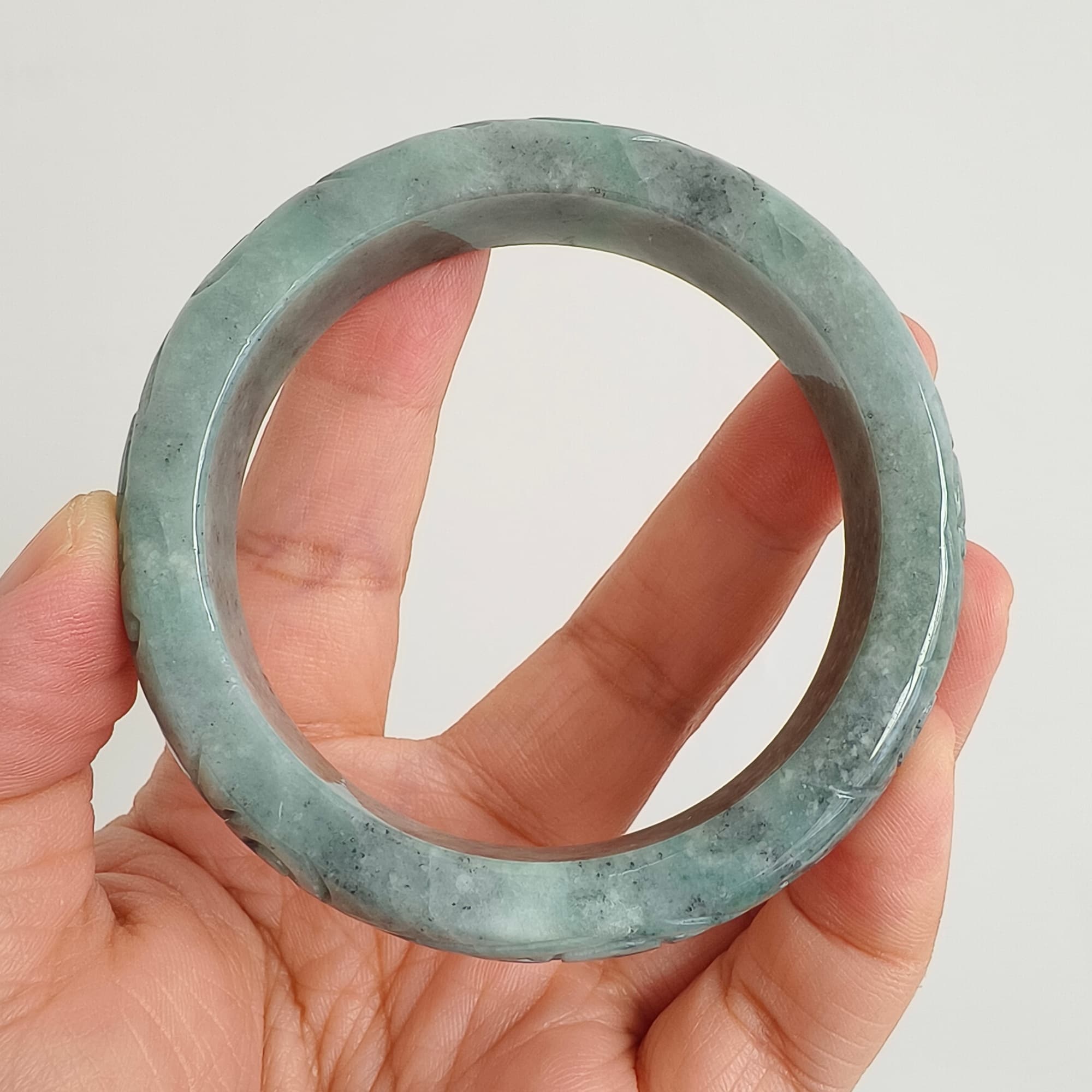 DDP 56mm Natural Type A Black Chicken Species Burmese Jadeite Round Band Bangle With Ruyi Carved