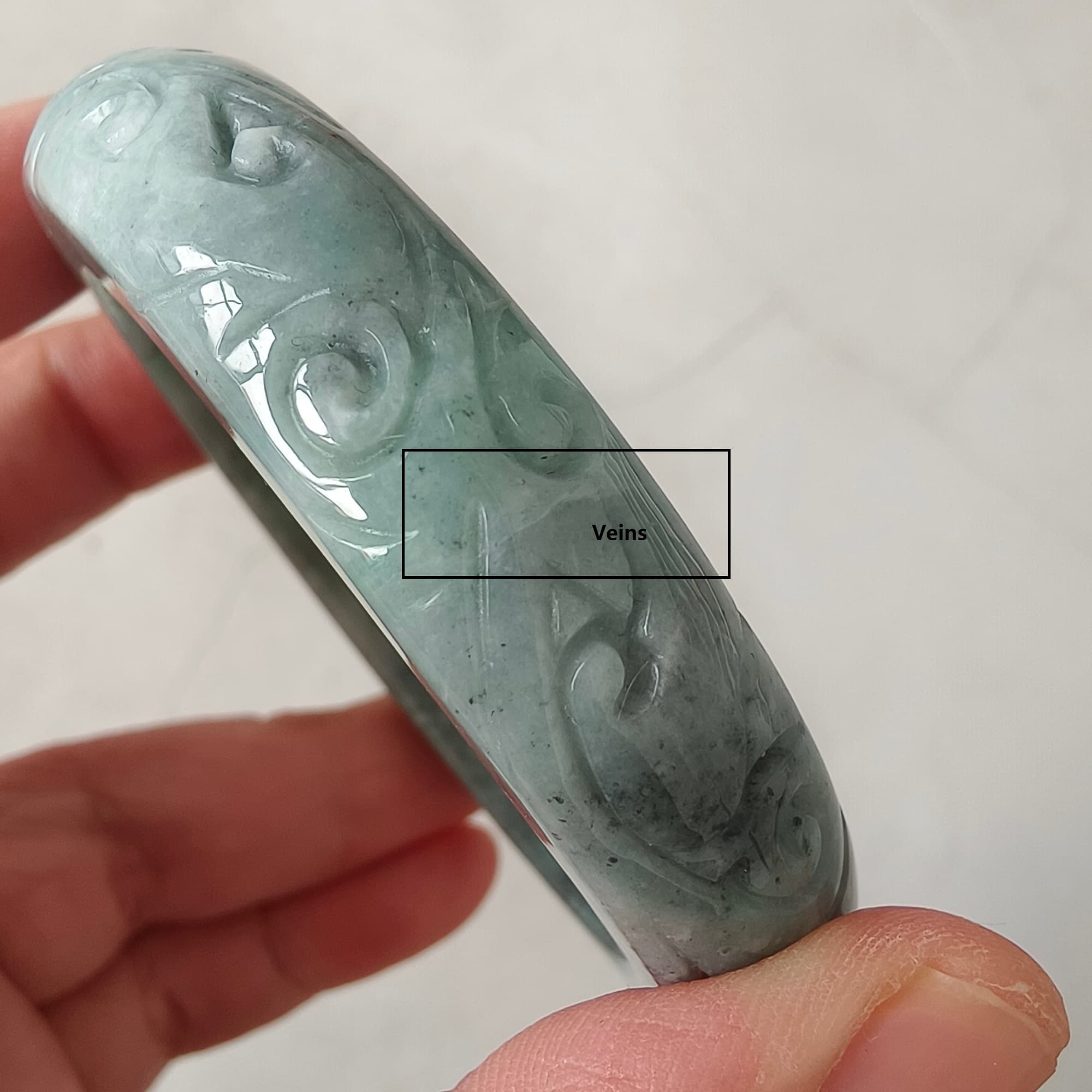 DDP 56mm Natural Type A Black Chicken Species Burmese Jadeite Round Band Bangle With Ruyi Carved