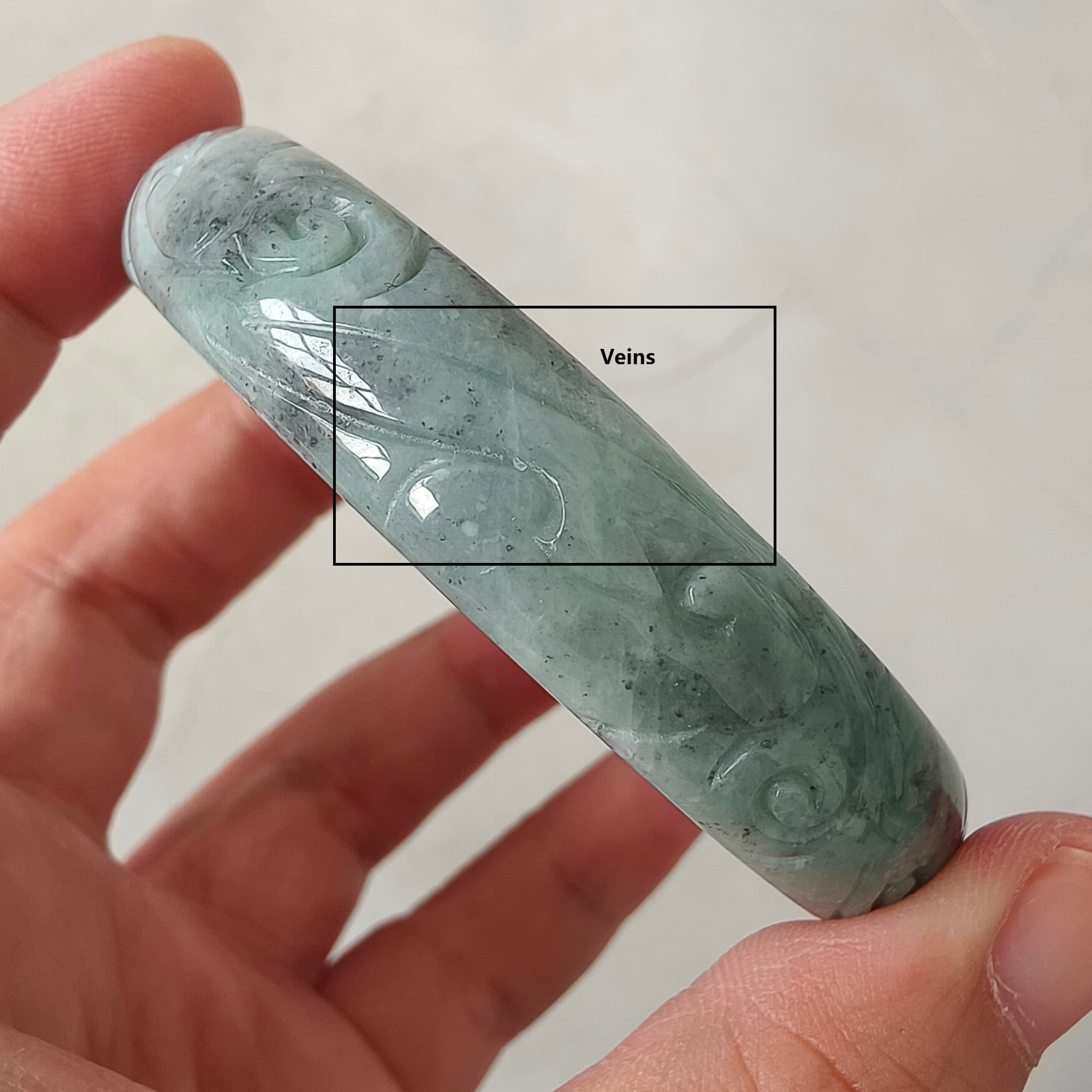DDP 56mm Natural Type A Black Chicken Species Burmese Jadeite Round Band Bangle With Ruyi Carved