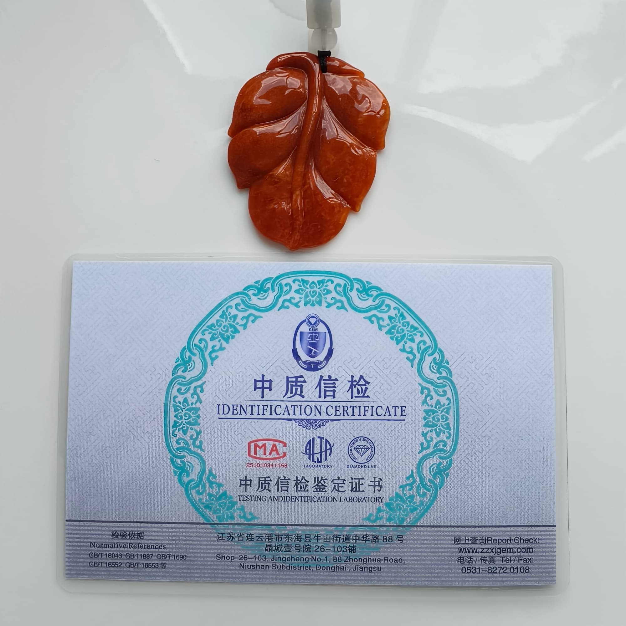 DDP 49mm Natural Certificated Red Burmese Jadeite Leaf Pendant