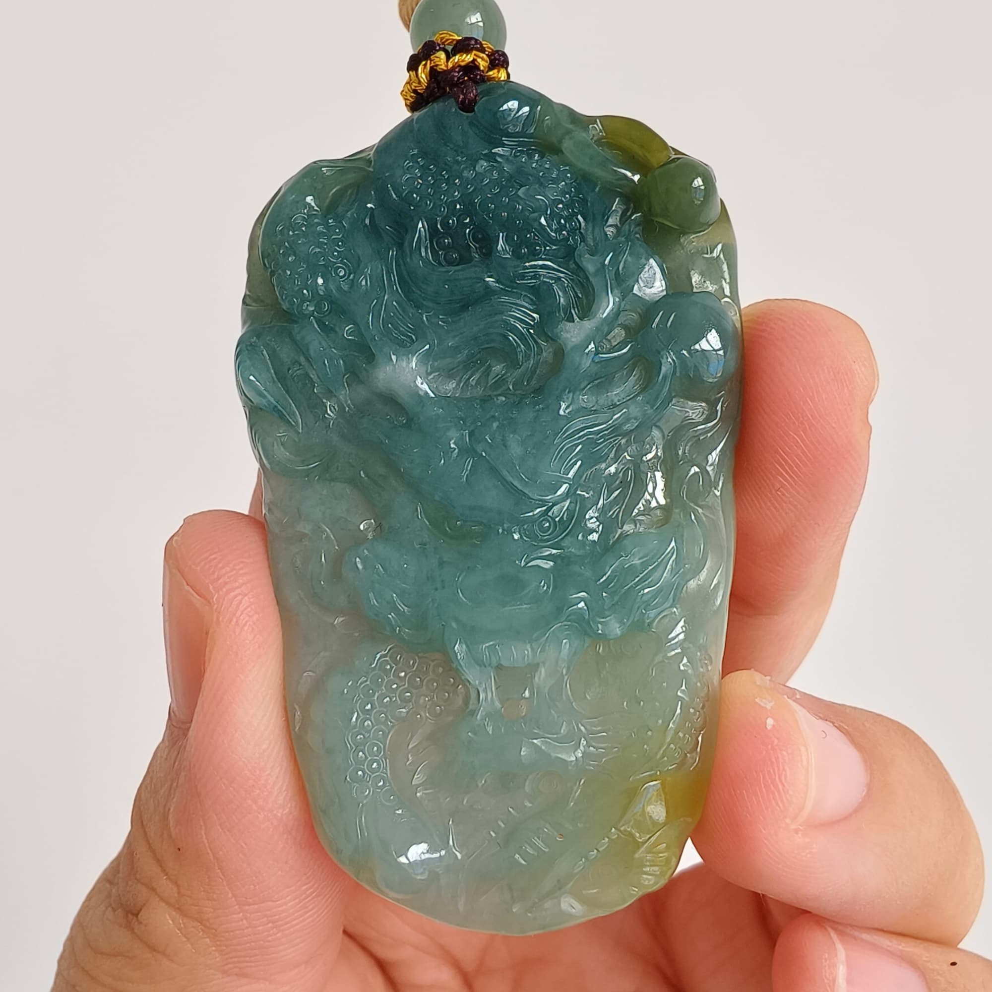 DDP 55.5mm Natural Type A Icy Blue Yellow Guatemalan Jadeite Dragon Pendant