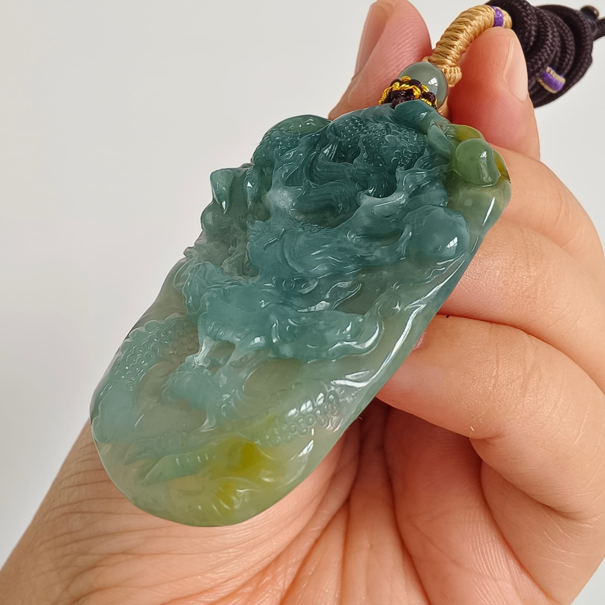 DDP 55.5mm Natural Type A Icy Blue Yellow Guatemalan Jadeite Dragon Pendant