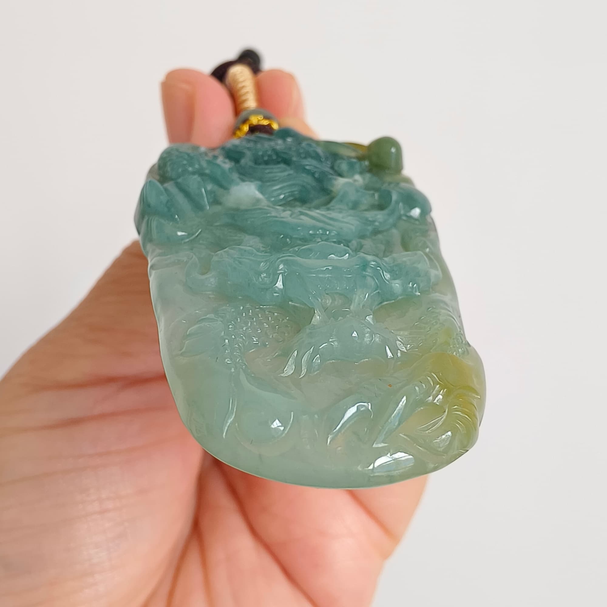 DDP 55.5mm Natural Type A Icy Blue Yellow Guatemalan Jadeite Dragon Pendant