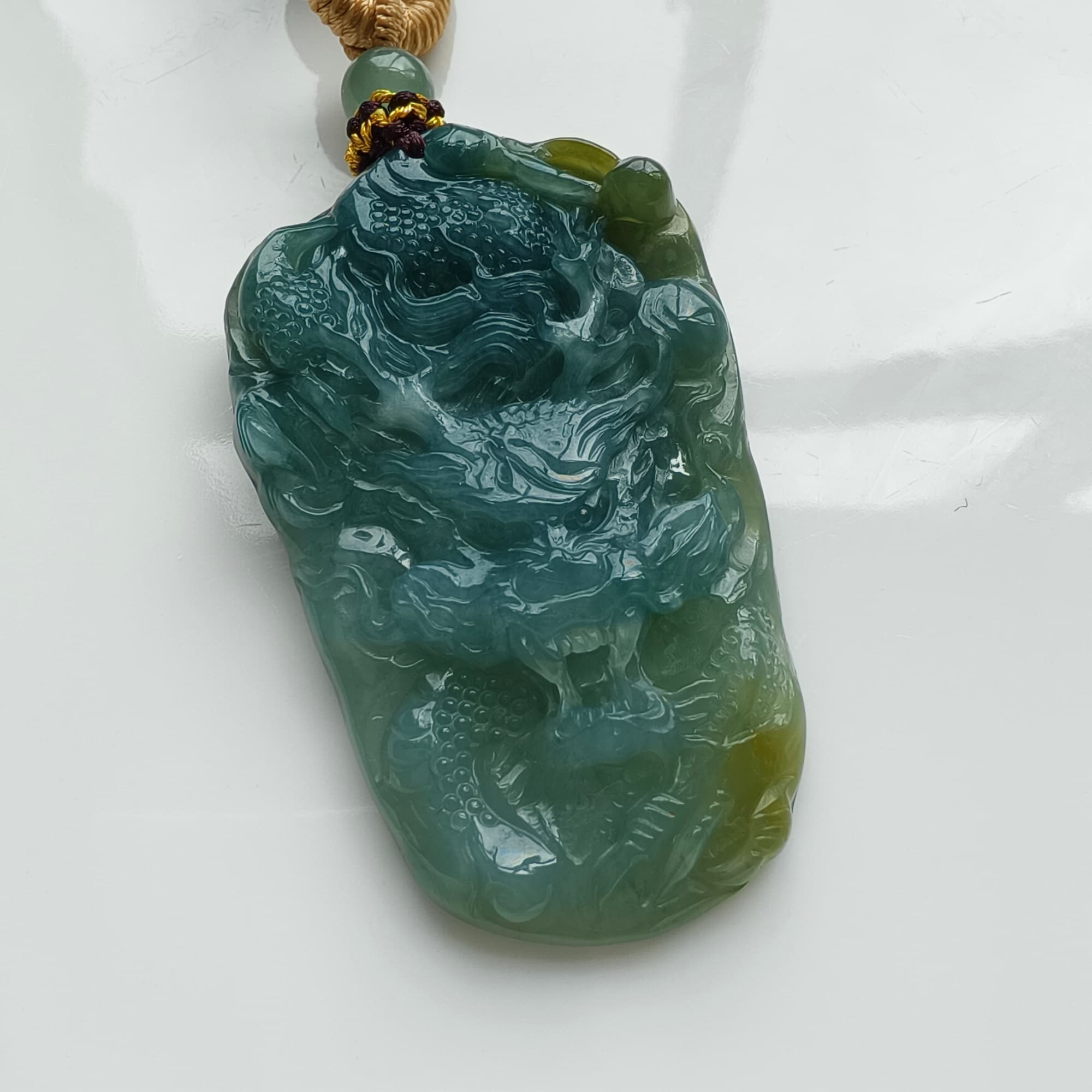 DDP 55.5mm Natural Type A Icy Blue Yellow Guatemalan Jadeite Dragon Pendant