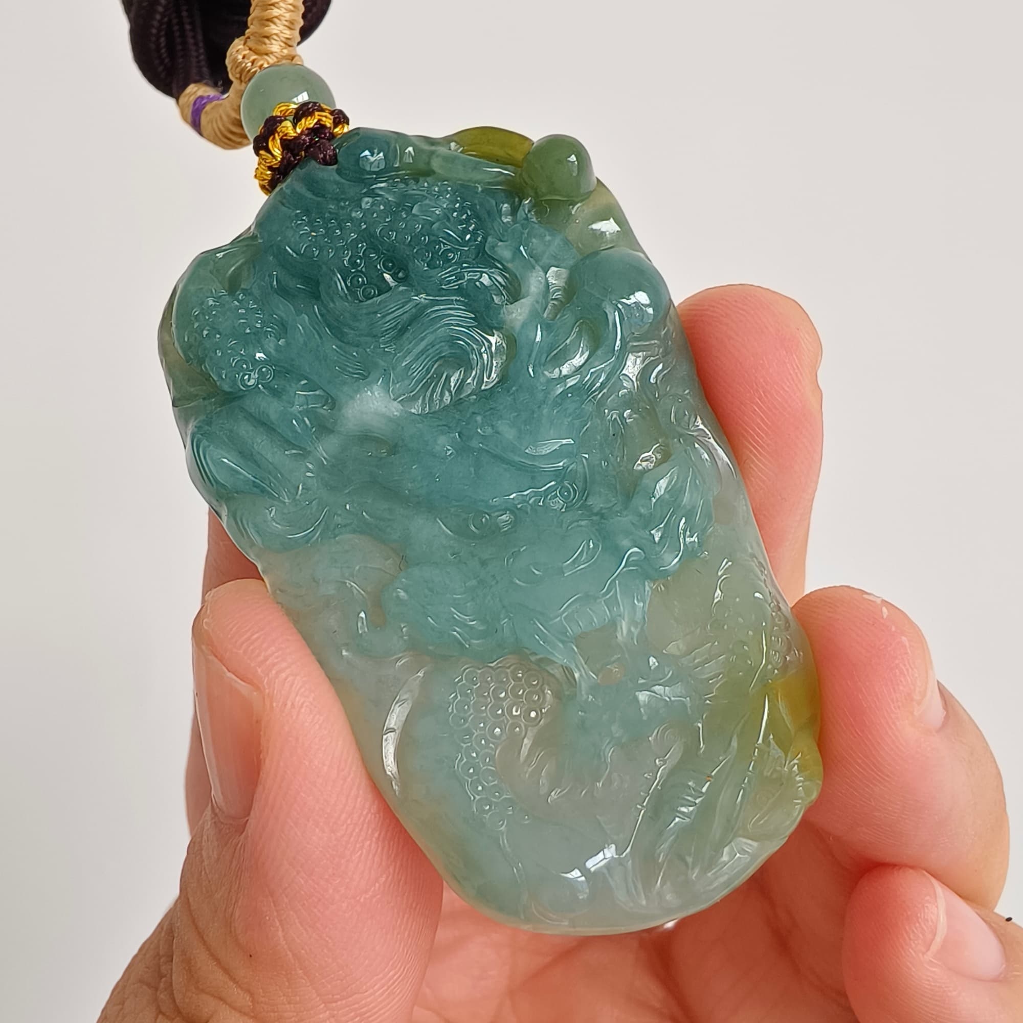 DDP 55.5mm Natural Type A Icy Blue Yellow Guatemalan Jadeite Dragon Pendant