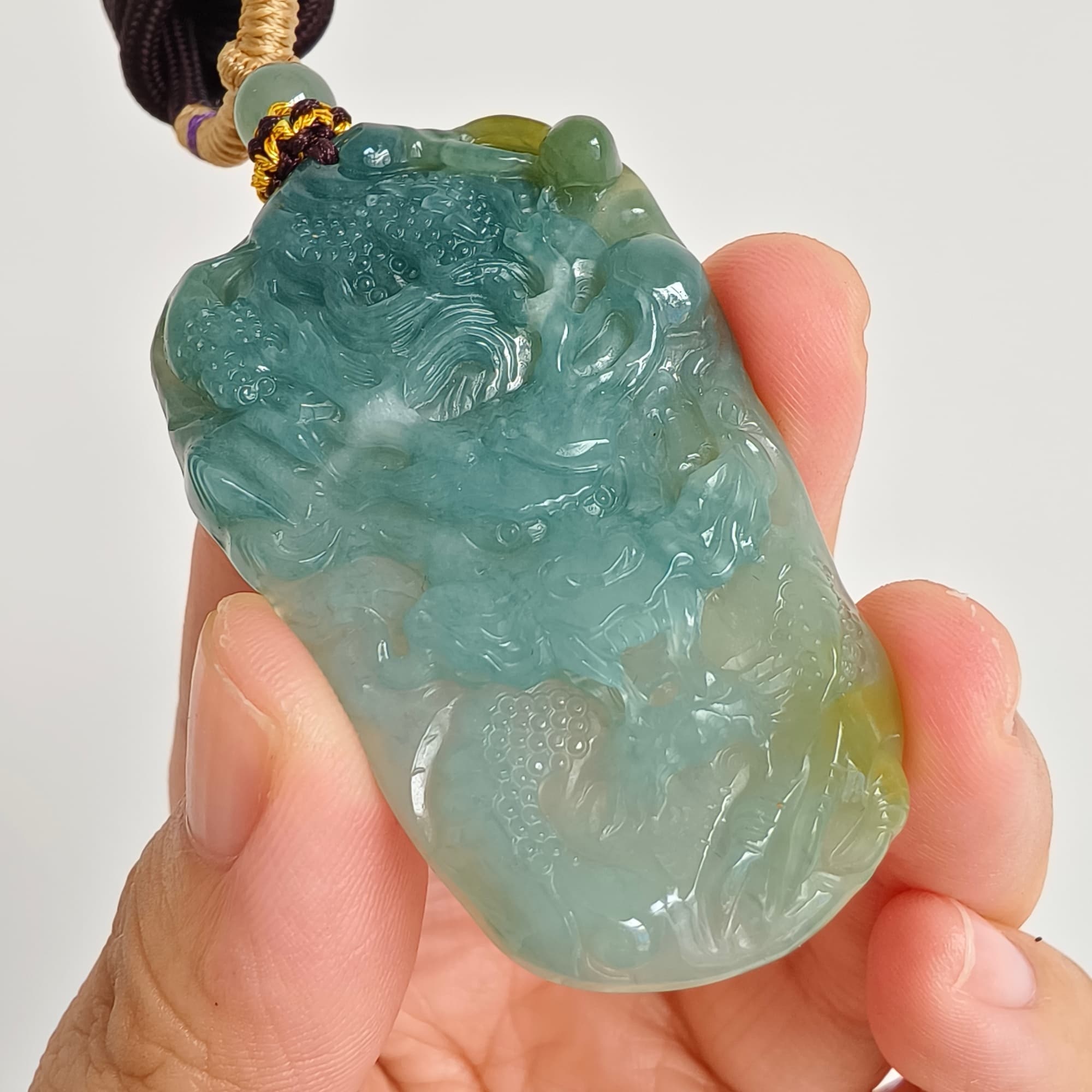 DDP 55.5mm Natural Type A Icy Blue Yellow Guatemalan Jadeite Dragon Pendant